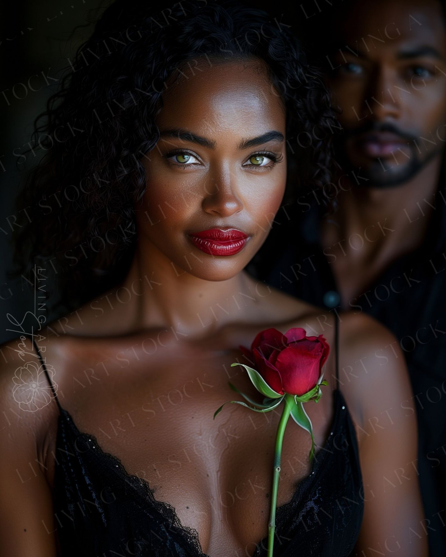 A striking and high-impact editorial portrait of a beautiful Black woman holding a deep red rose against her chest. She has captivating green eyes, dark curly hair, and wears bold red lipstick and a black lace camisole or slip top. A handsome Black man is