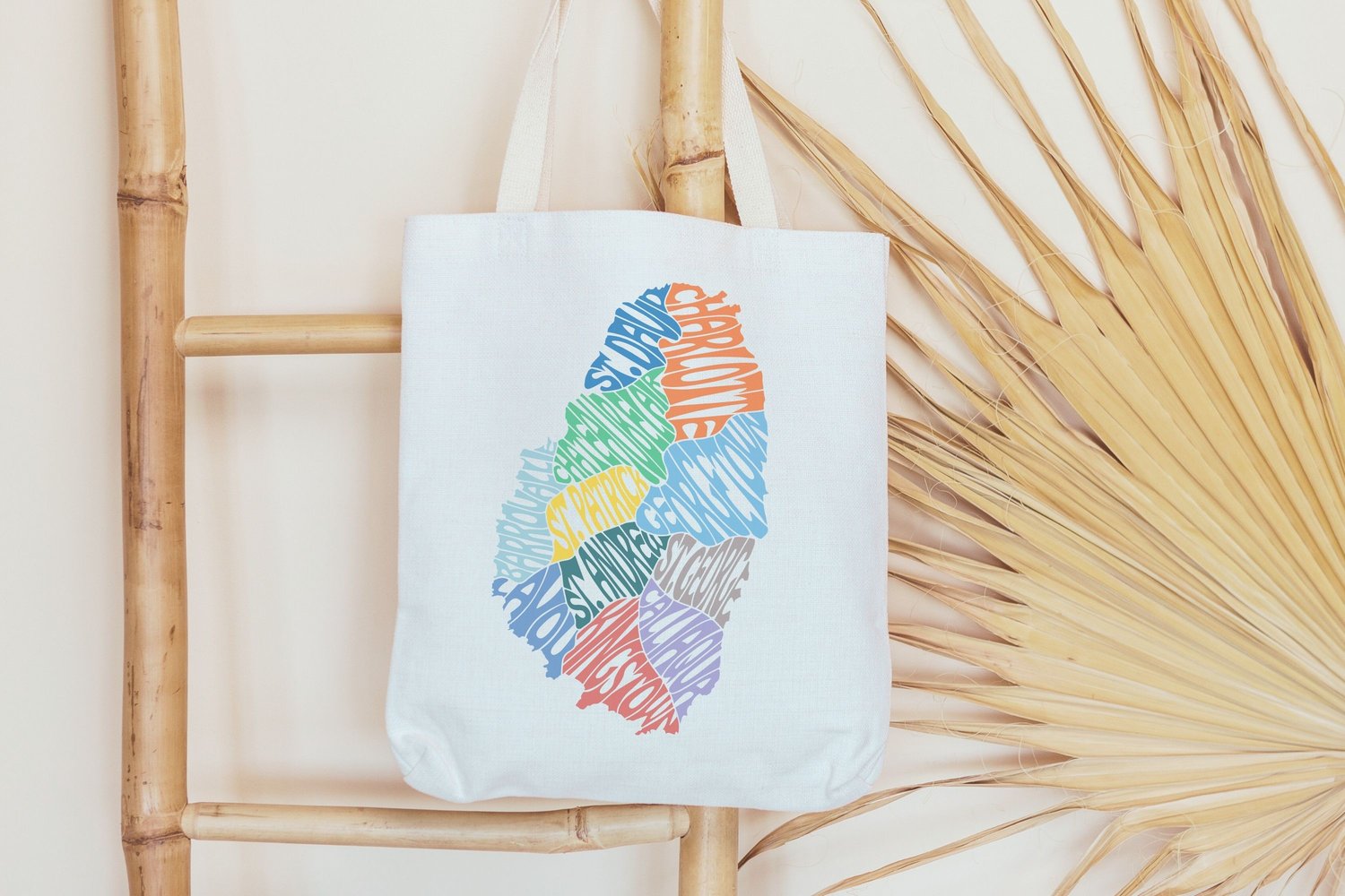 This design features the words ST. ANDREW, ST. DAVID, ST. GEORGE, ST. PATRICK, CHARLOTTE, GEORGETOWN, KINGSTOWN, LAYOU, BARROUALLIE, CHATEAUBELAIR, CALLIAQUA creatively made in the shape of Saint Vincent island.