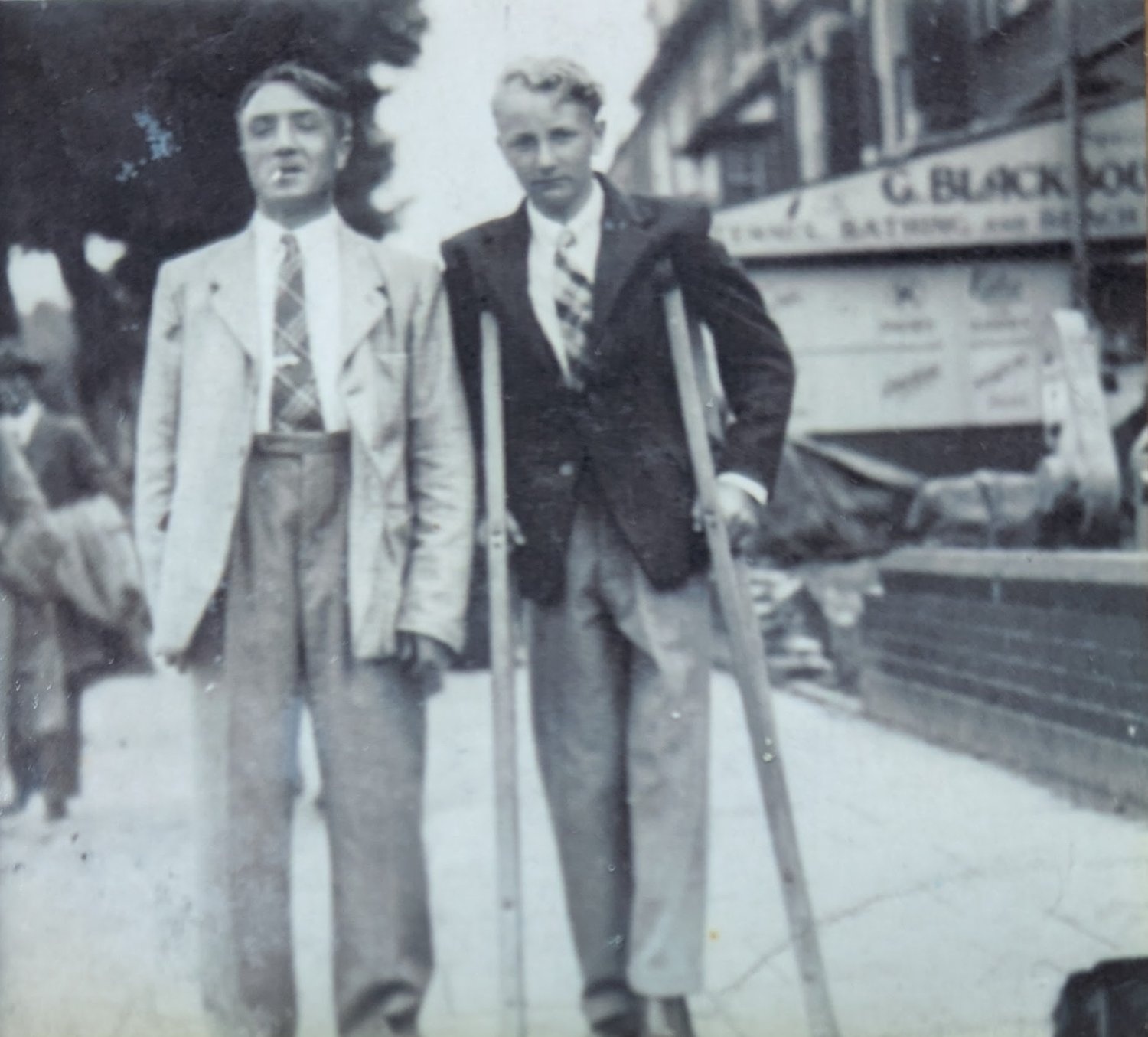 Harry with his father. Believed to be in Skegness.