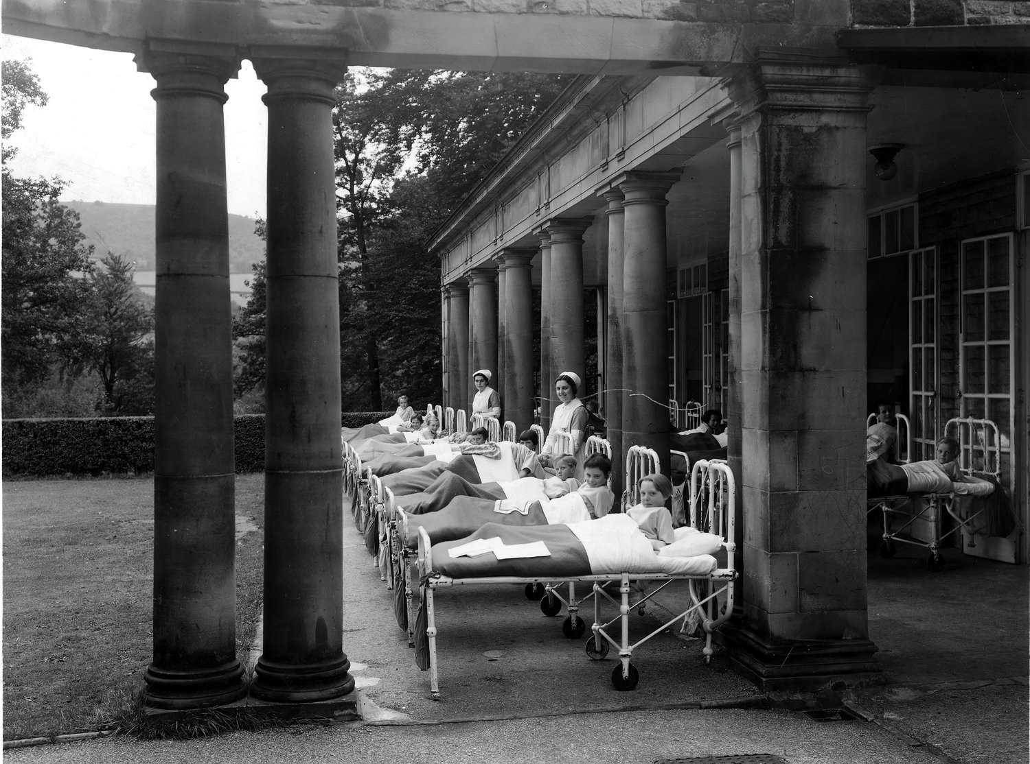 A staged photograph of girls taking fresh air treatment at the King Edward VII Memorial Hospital for Crippled Children, Photo taken between 1920-1939. ©Picture Sheffield (Image s07418)