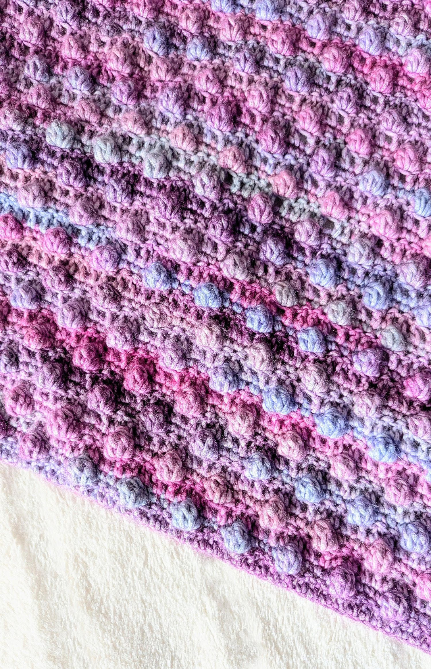 Skyline Bobble Blanket Laying on Bed