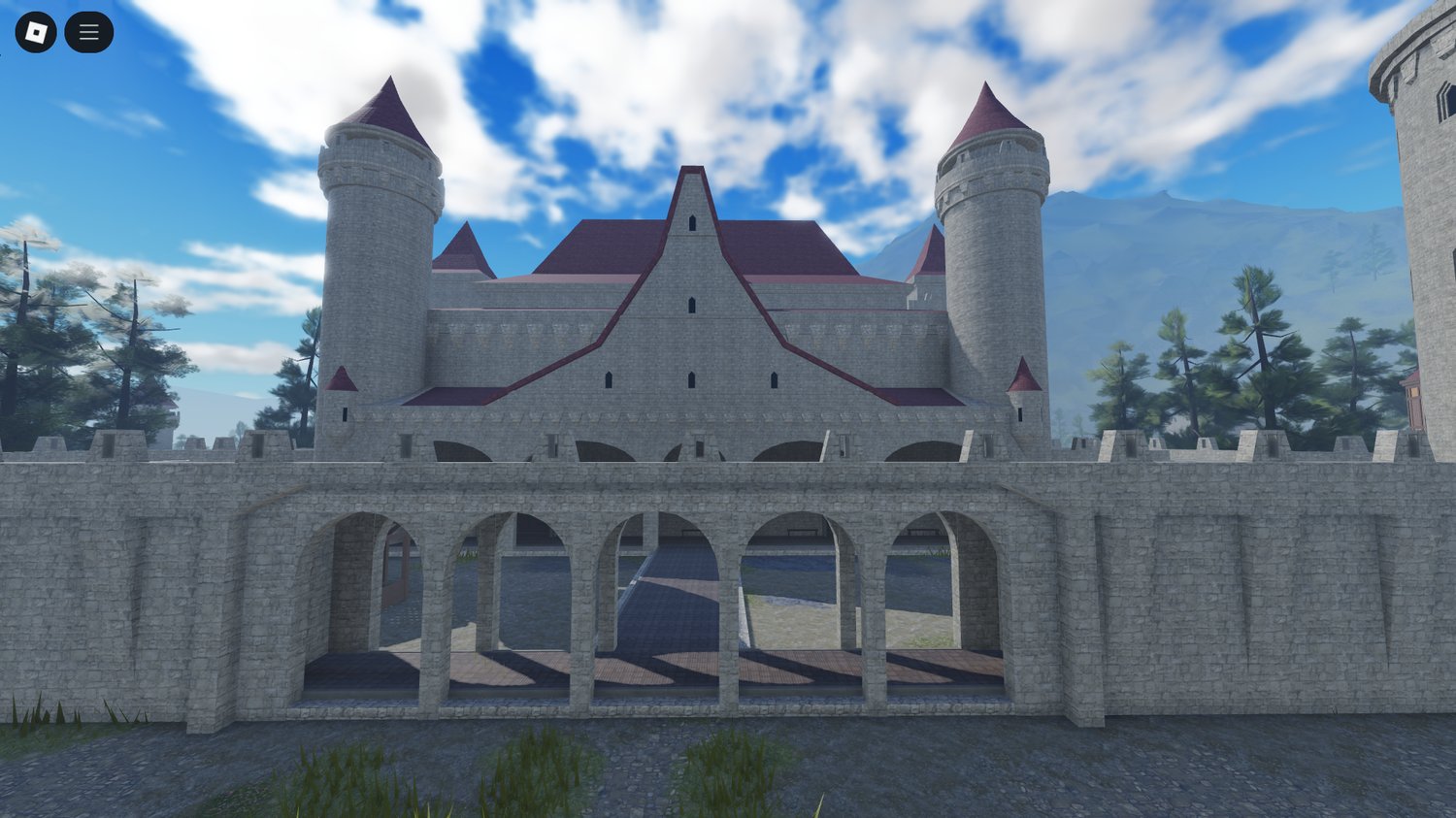 Stone fortress with watchtowers Roblox build