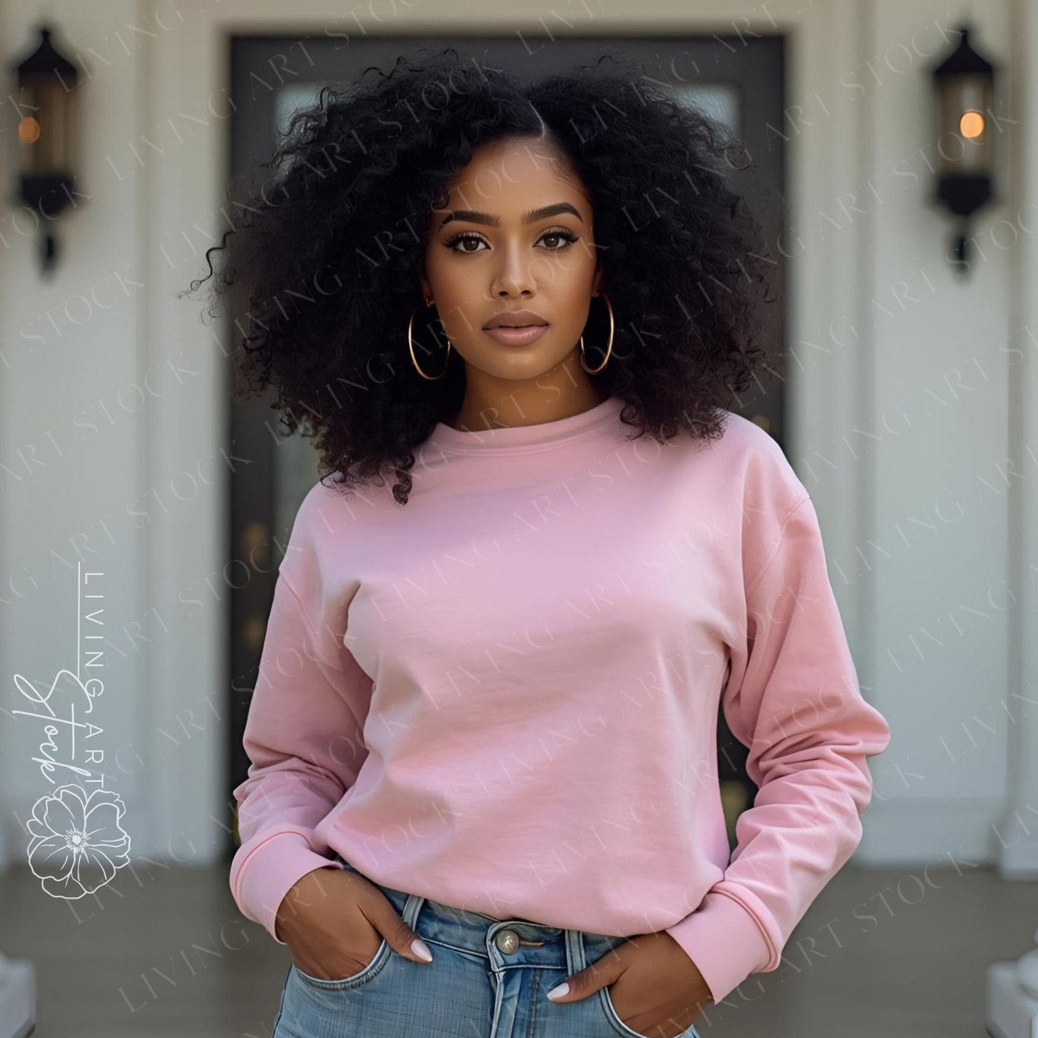 A striking, medium close-up portrait features a beautiful young Black woman with gorgeous, full, natural curly hair. She stands with a serious, confident expression, looking directly at the camera. The woman is wearing a plain, oversized light pink or sof