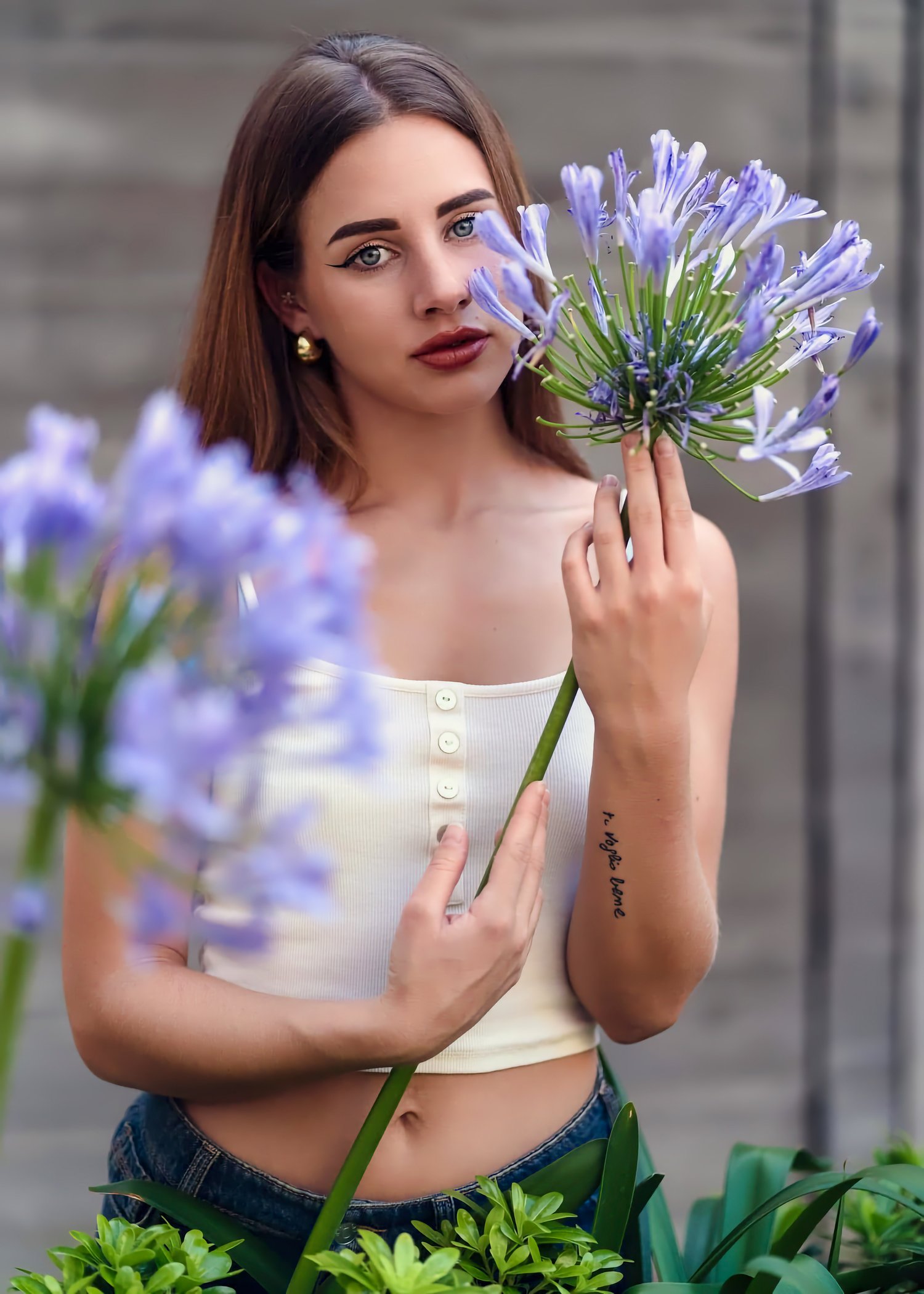 Portrait of woman surrounded by purple flowers, artistic natural light and vivid color – ADM Photography New Jersey — Creative Portrait by ADM Photography