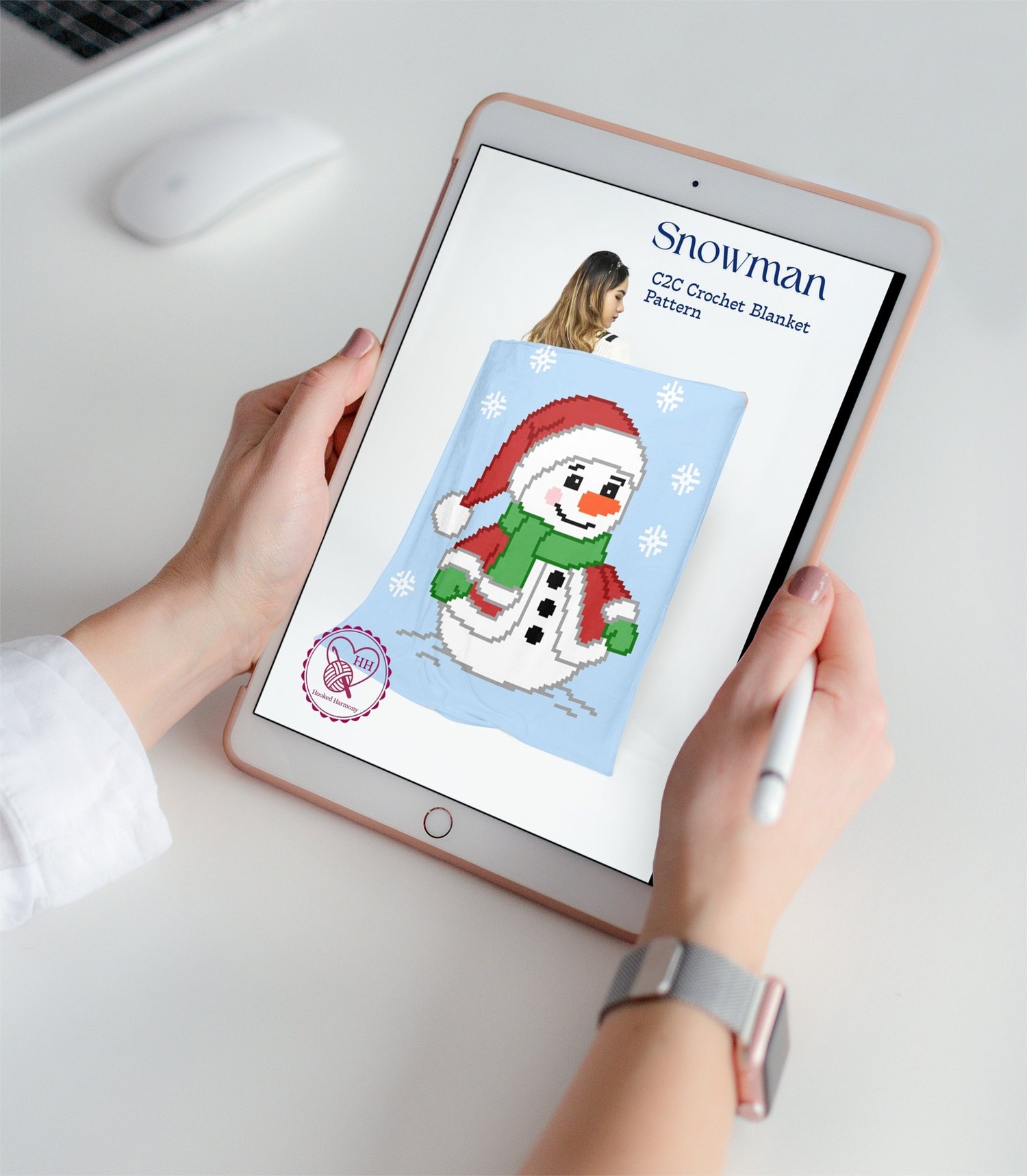 Snowman C2C crochet blanket pattern cover displayed on tablet