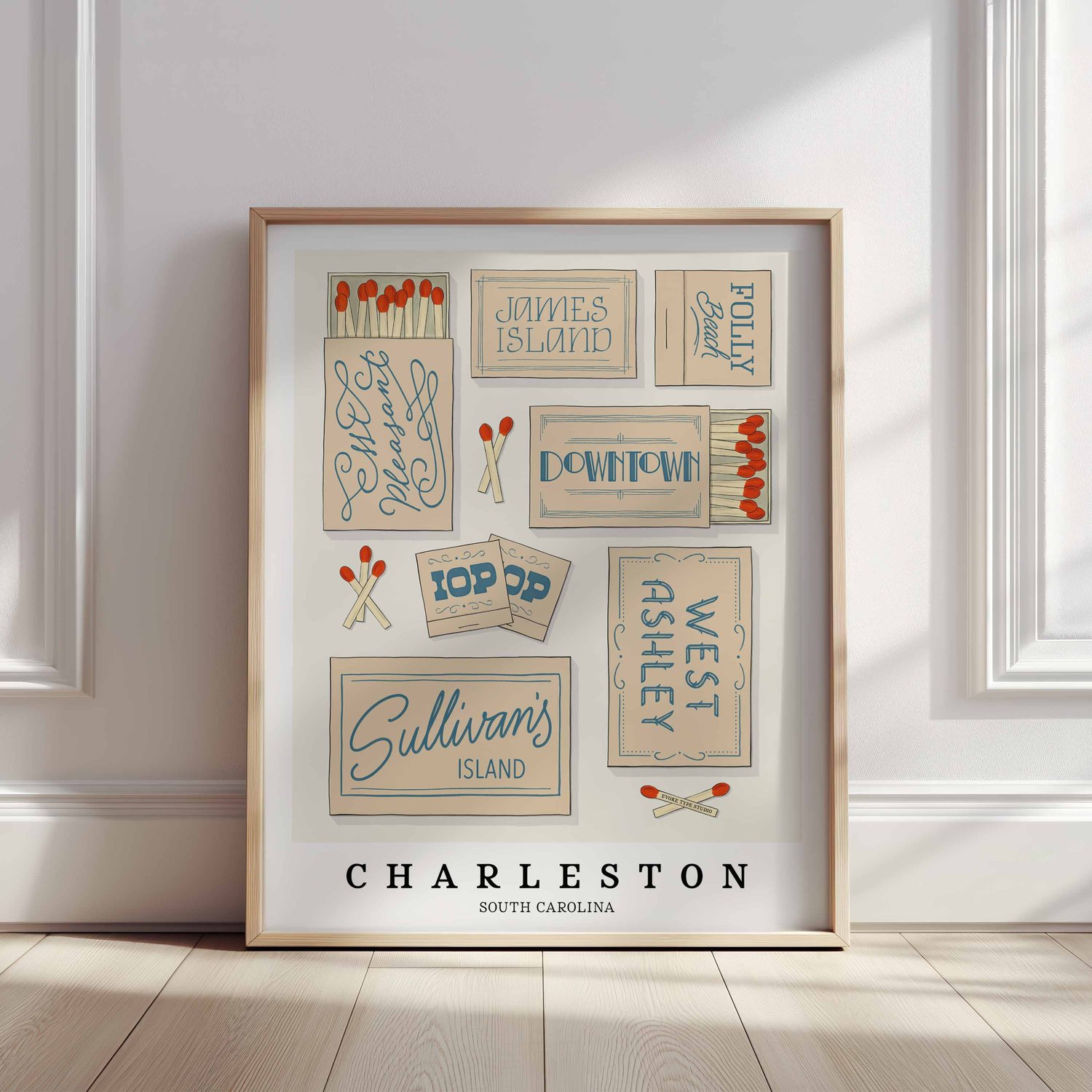 Typography-focused Charleston wall art with illustrated matchboxes in soft blue and beige hues