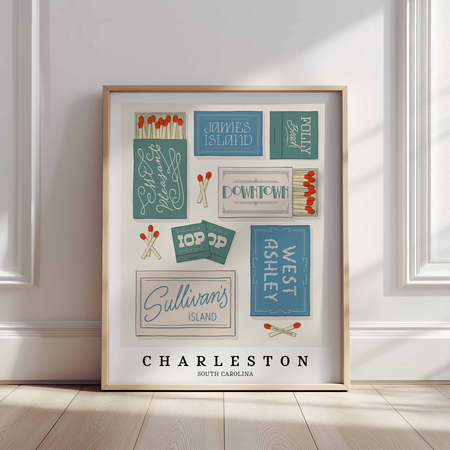 Hand-drawn Charleston matchbox wall art featuring coastal-inspired lettering in soft blue, green, and beige tones