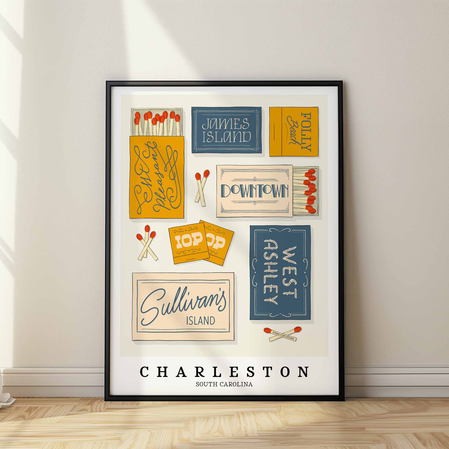 Charleston neighborhood matchbox art print with hand-lettered typography in a color palette of warm blues, yellows, and beige tones
