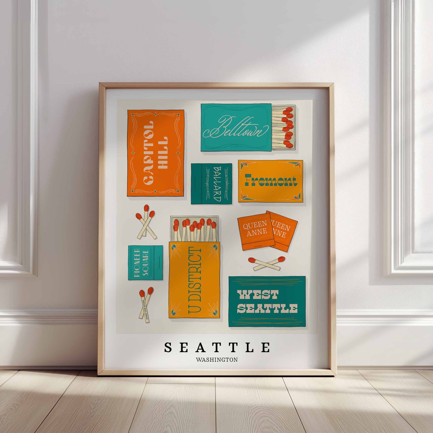 Hand-drawn Seattle matchbox wall art featuring custom lettering in bright blue and orange tones