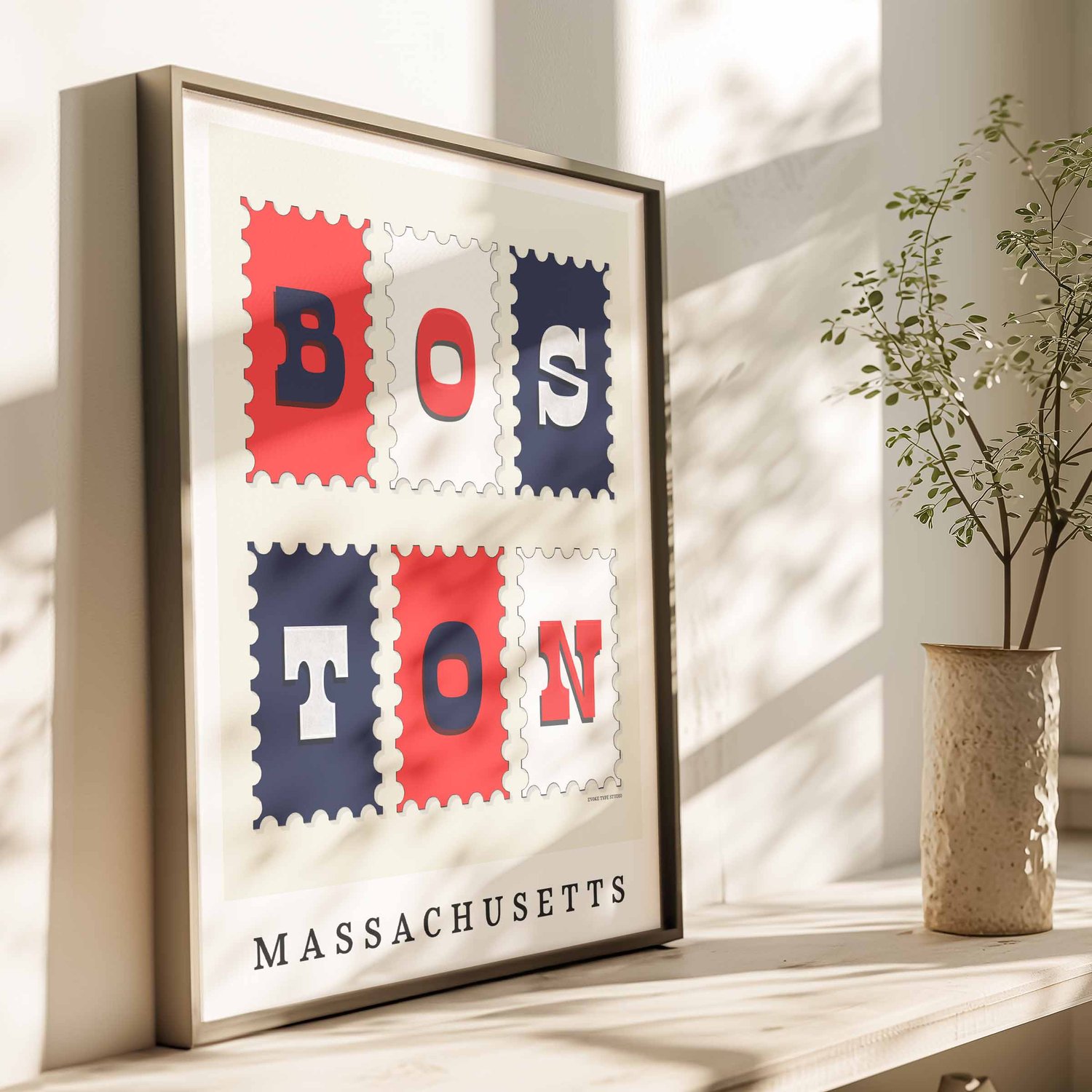 Postage stamp style Boston wall art showcasing playful typography in a patriotic color palette.