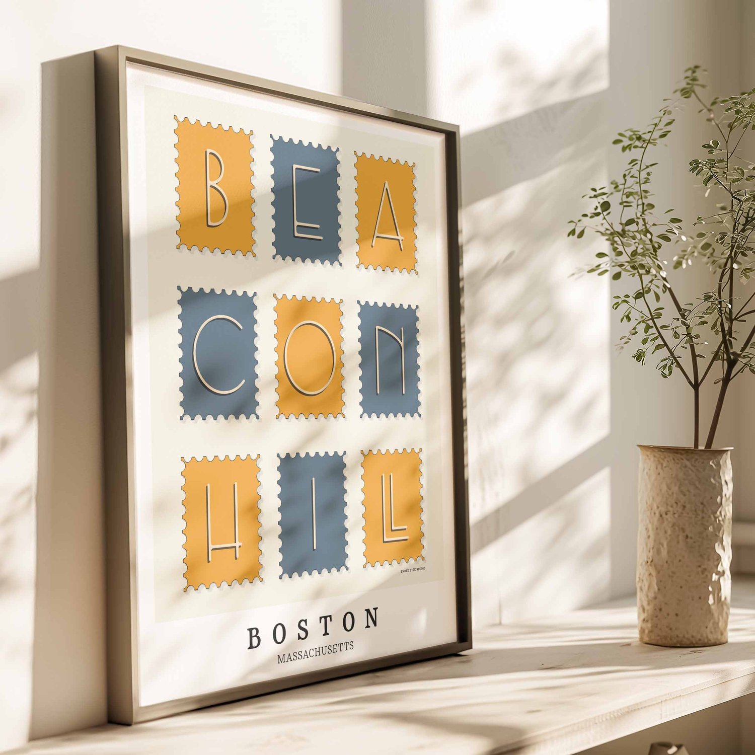 Boston wall art showing a Beacon Hill postage stamp collection design in warm yellow and deep blue tones.
