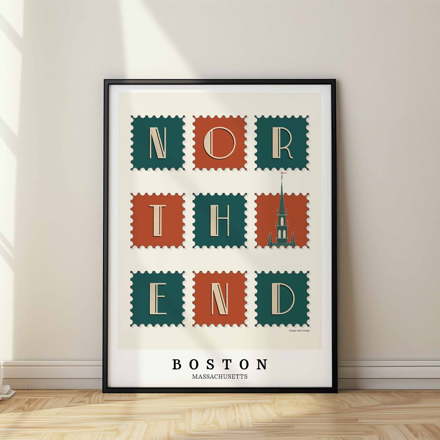 Hand-drawn North End wall art featuring a postage stamp-style design with art deco lettering and an Old North Church illustration.