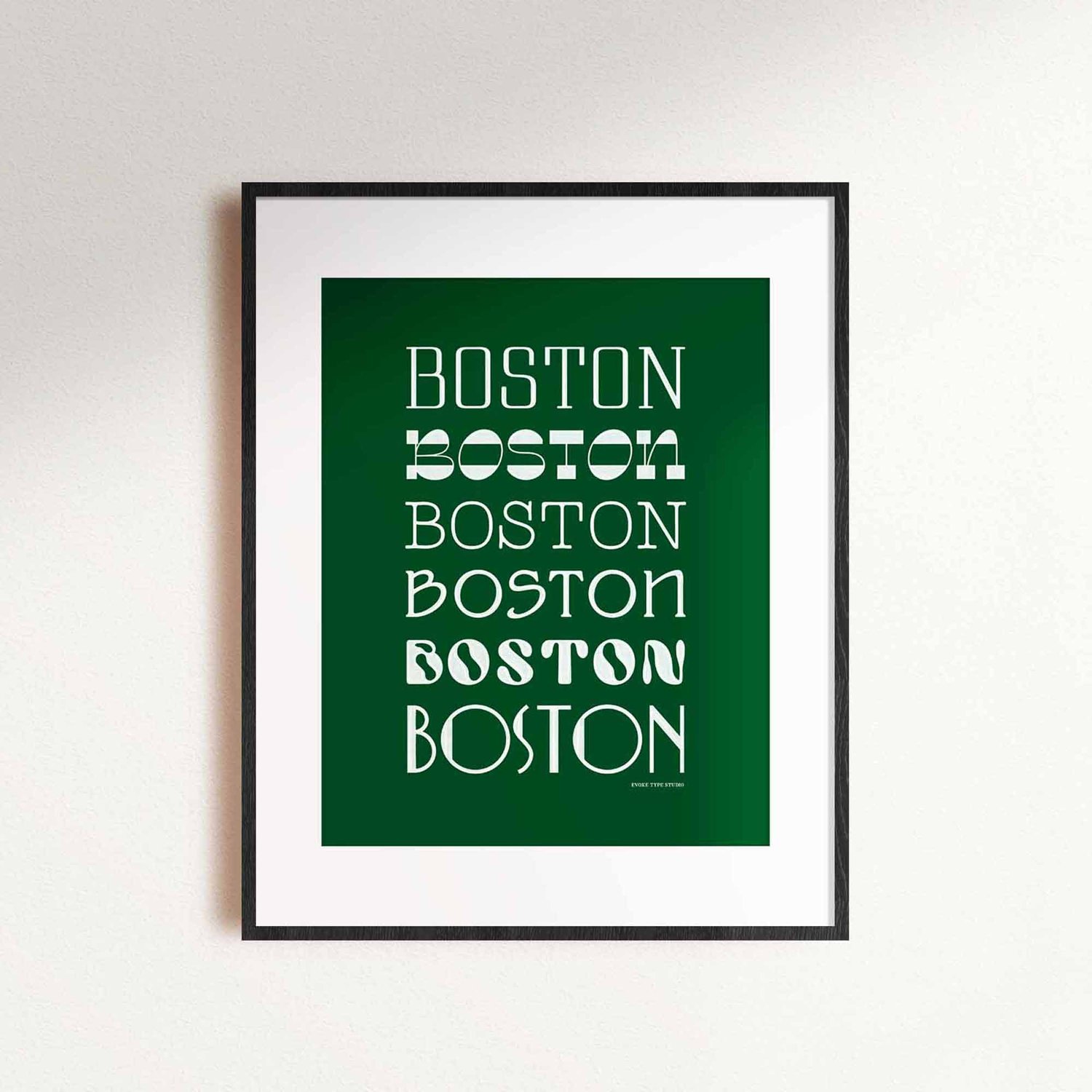 A framed picture of the word "Boston" drawn in various lettering styles. Artwork has a green and white color scheme