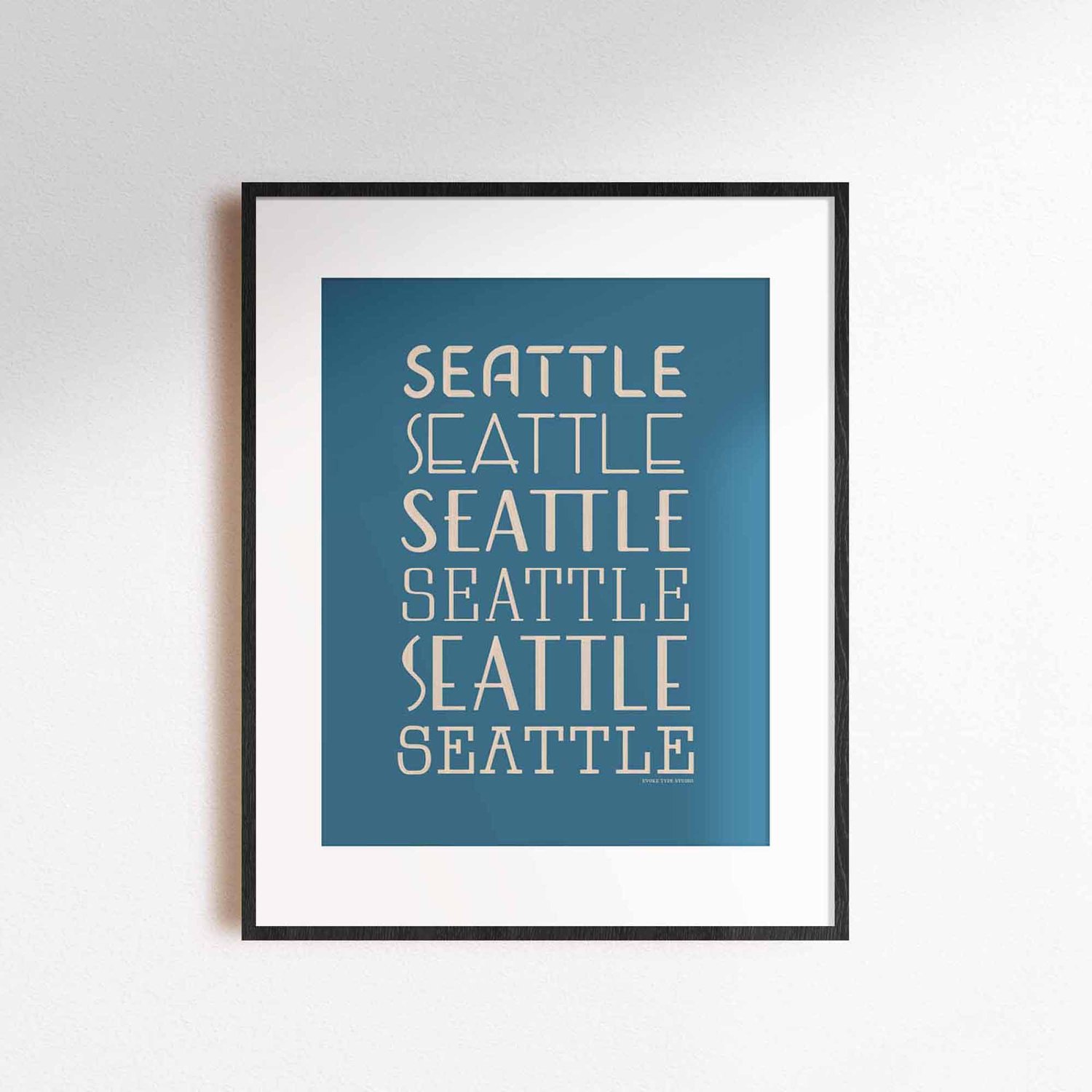 Typography-focused Seattle city print with layered, hand-drawn letters in coastal-inspired colors