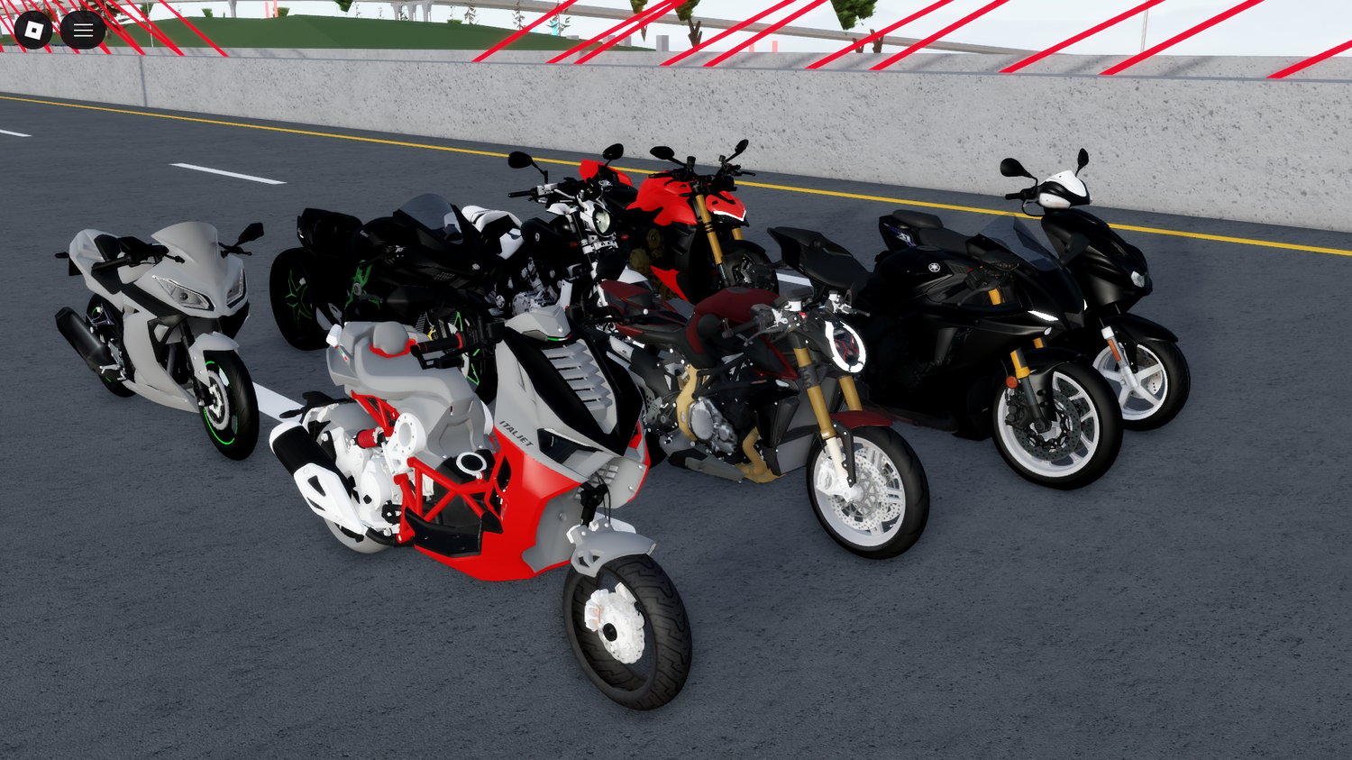 rider sitting on a sport bike in a city environment