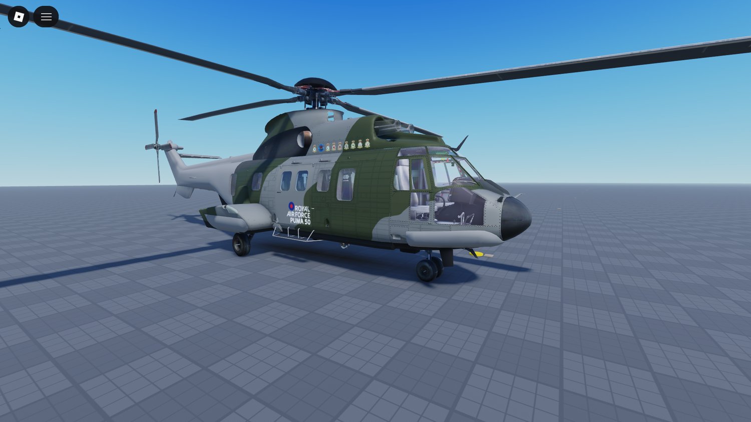 aerial view of multiple helicopters over an open terrain