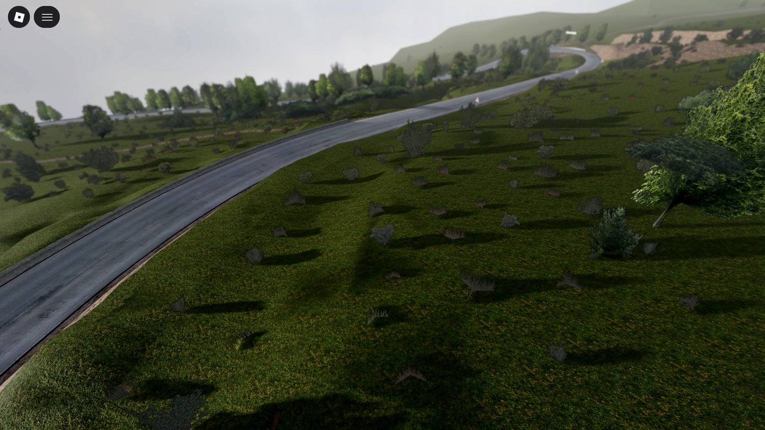 rocky hills and greenery lining the route roblox