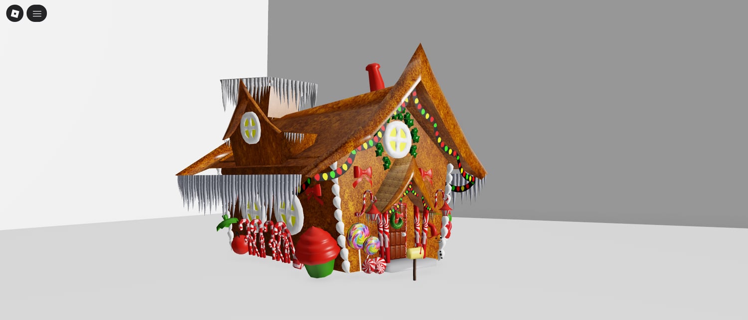 Close-up of gumdrop and frosting elements on gingerbread house