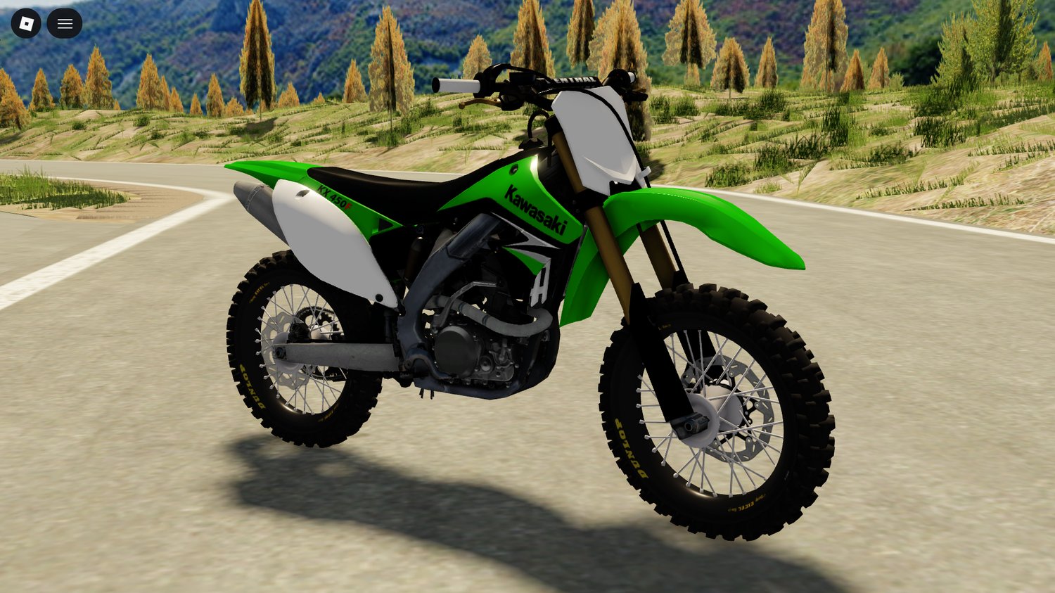 KX450 parked on off-road terrain