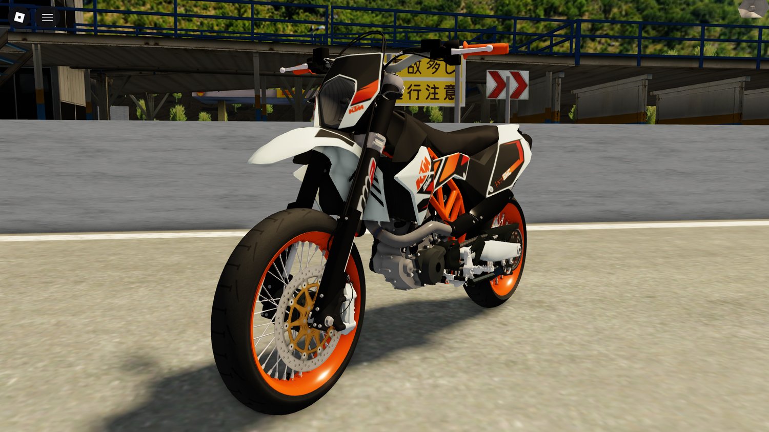 Rider taking SMC 690 onto mixed terrain
