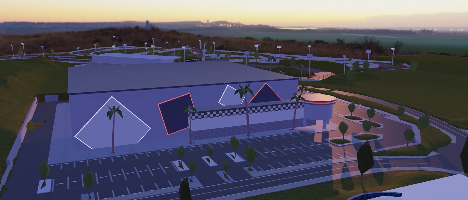 Roblox open-world Los Santos style map with racetrack and detailed terrain