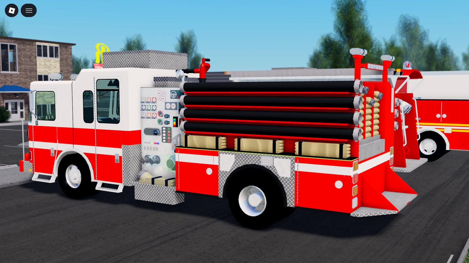 FDNY Midmount firetruck parked at station