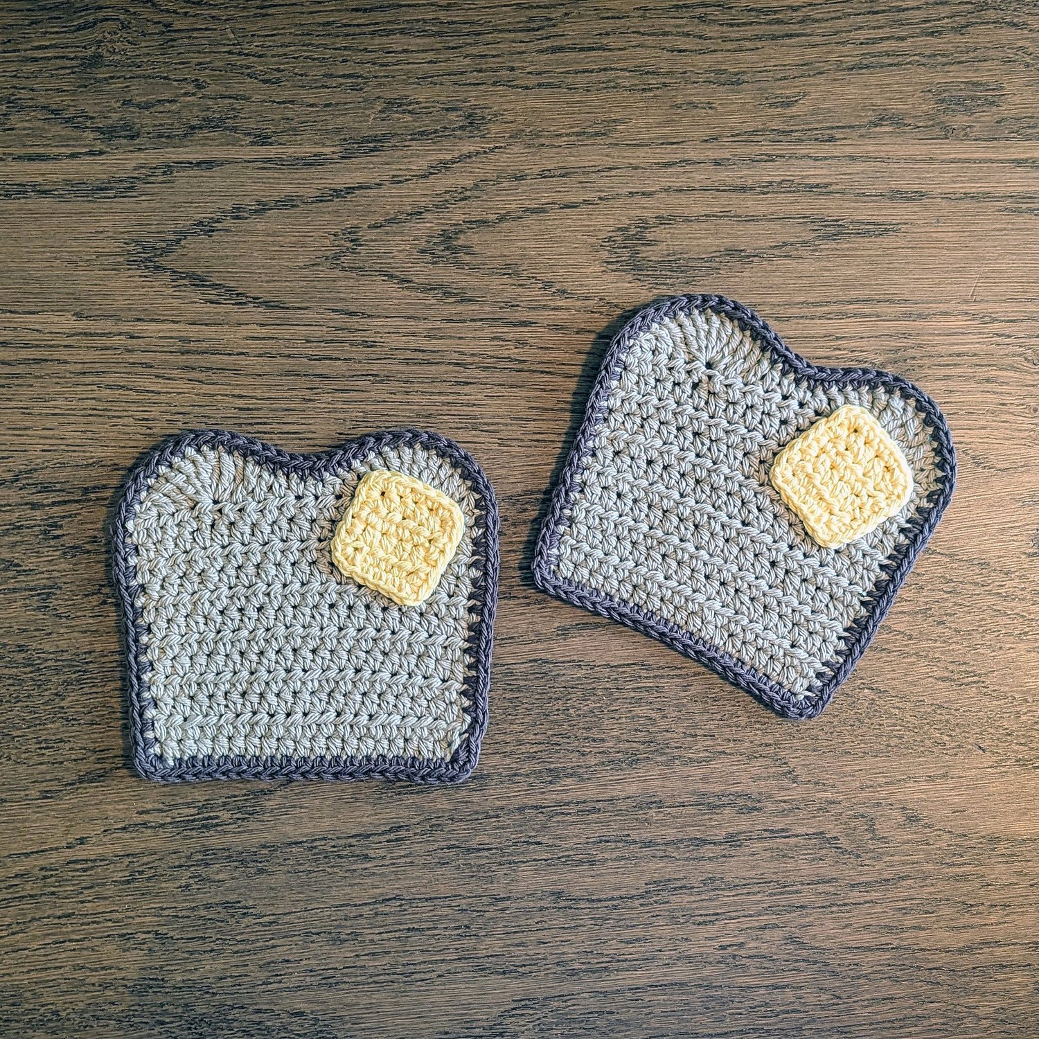 two buttered toast coasters