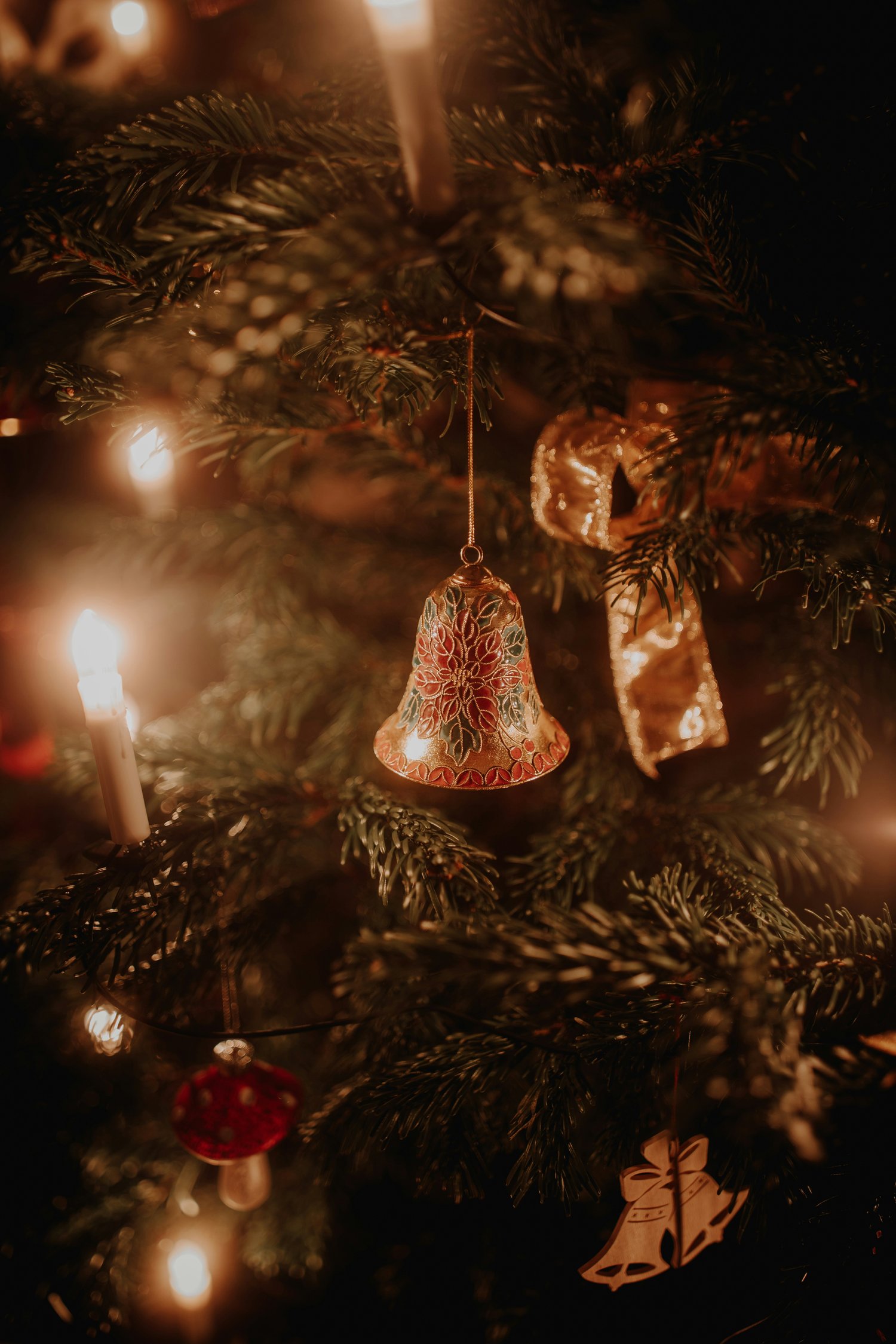 bell ornament on christmas tree