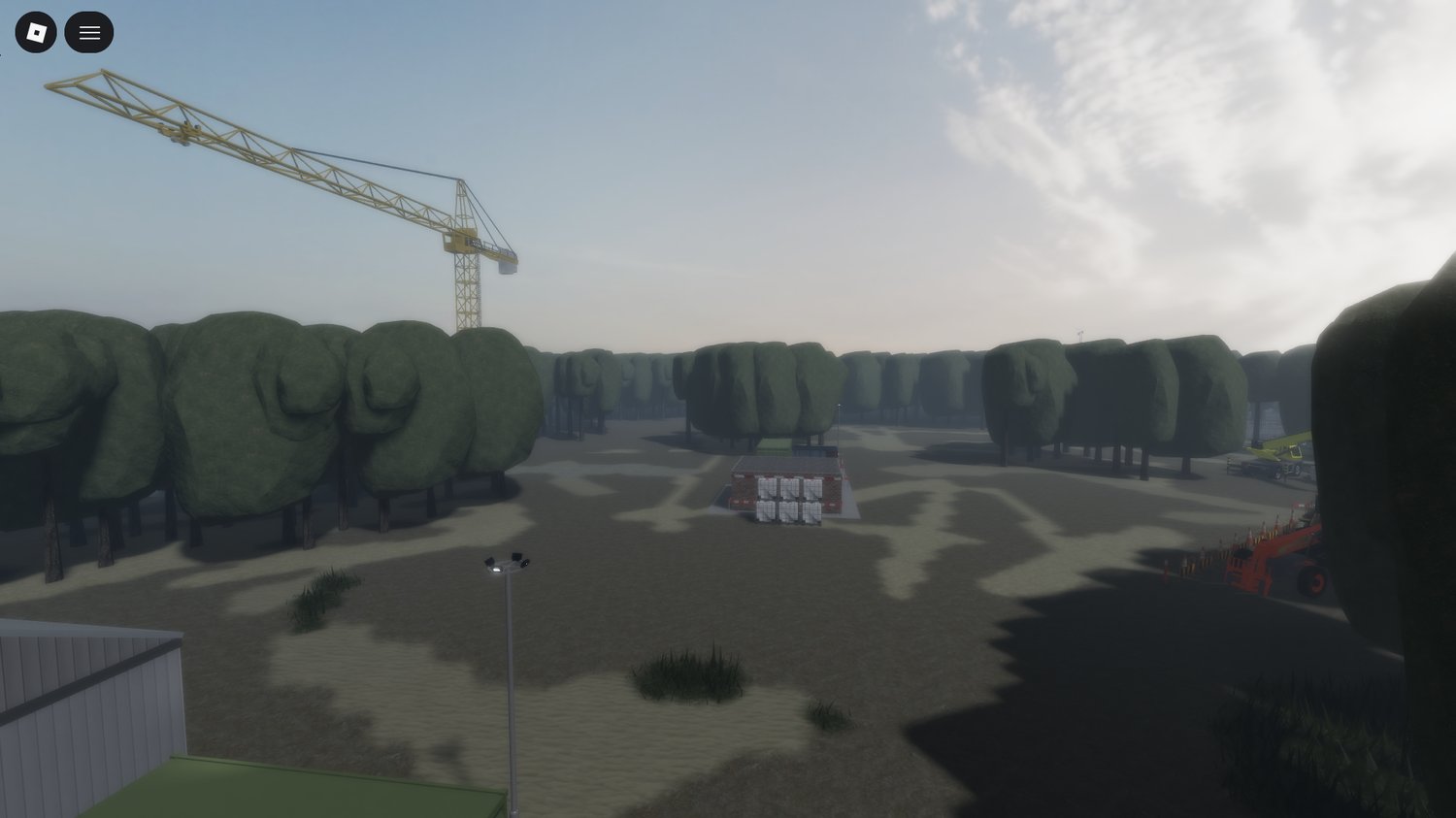 Ground-level view of enterable buildings in a Roblox military map
