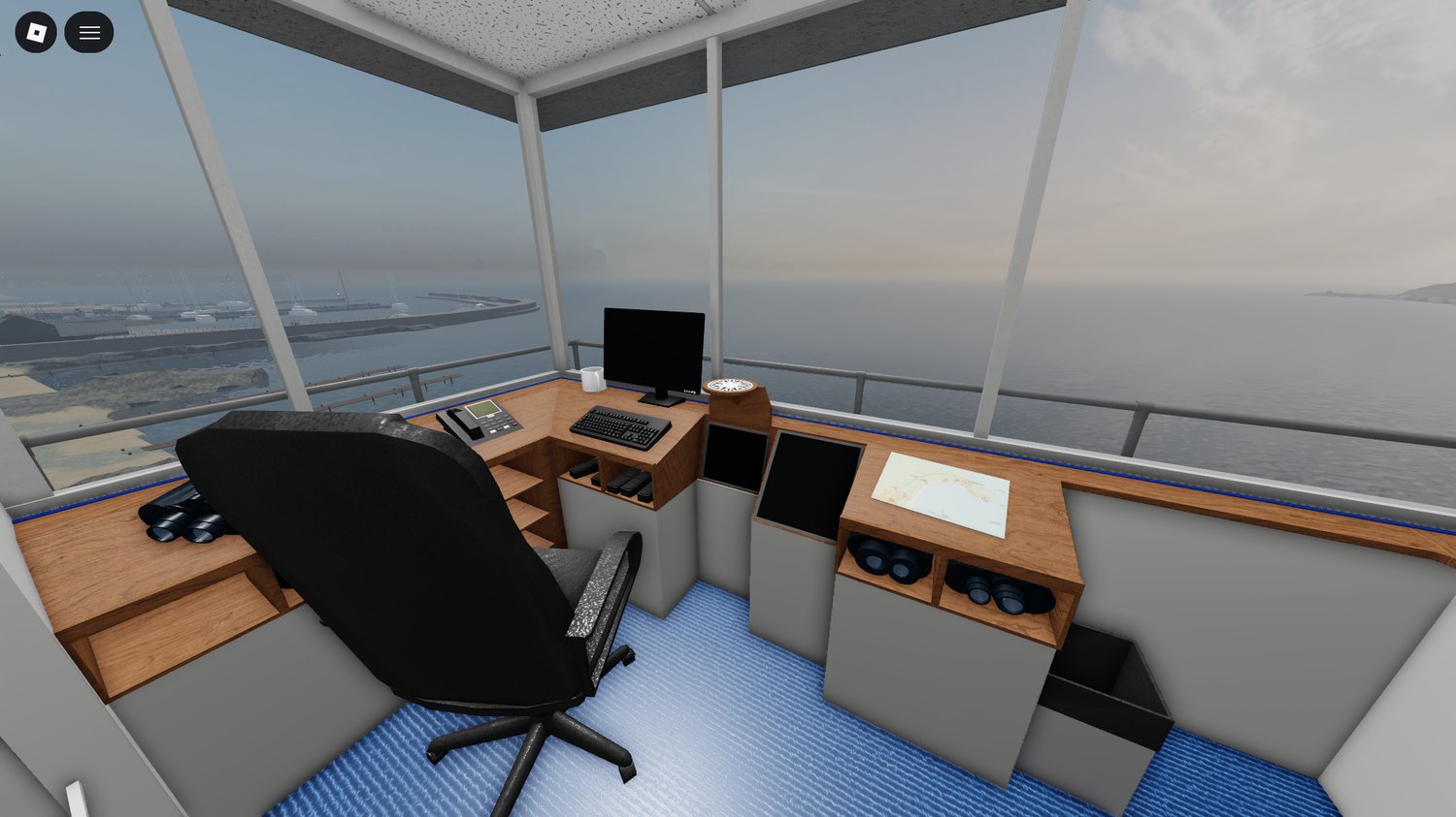 Wide seaside view of a large Roblox town environment