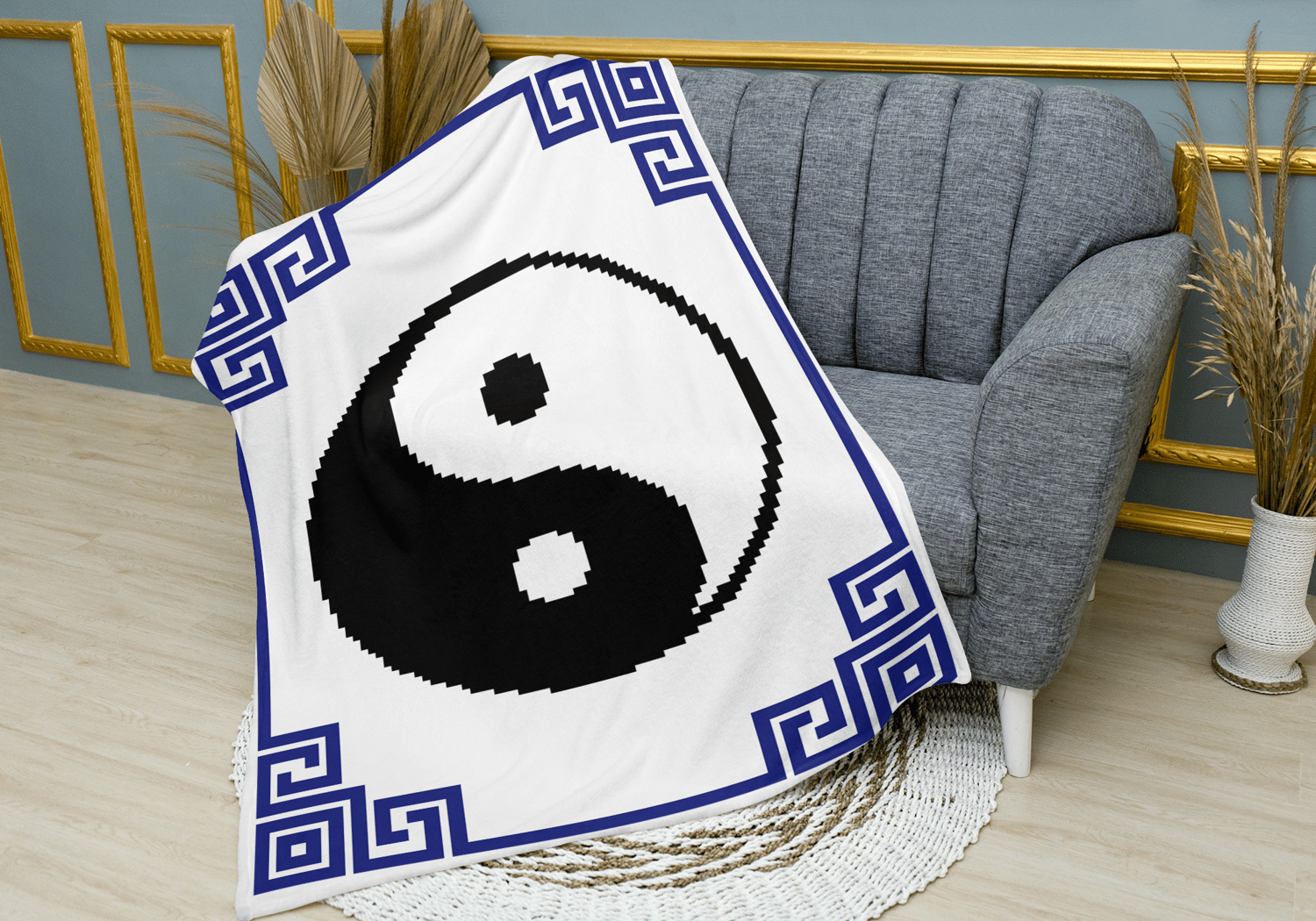 Finished Yin and Yang C2C crochet blanket draped over chair