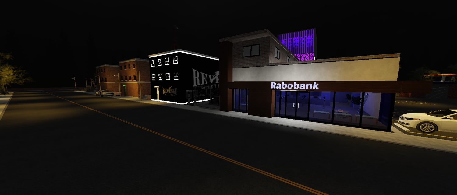 Streetlights illuminating a nightlife city scene in Roblox