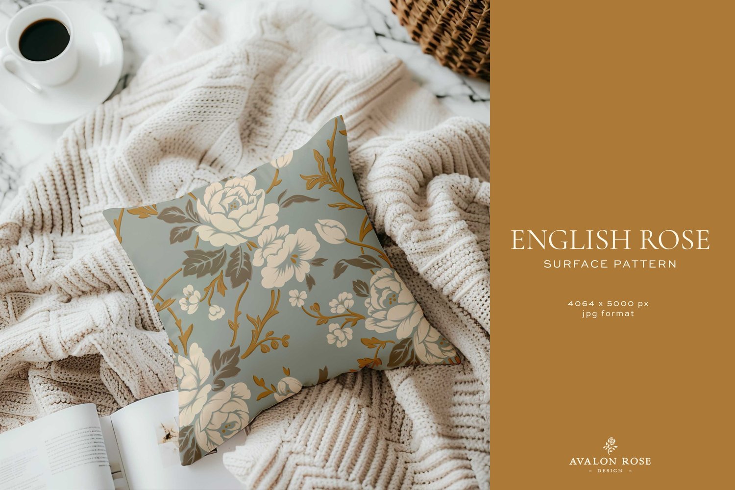 Pillow with a vintage rose pattern in muted blue gold and cream