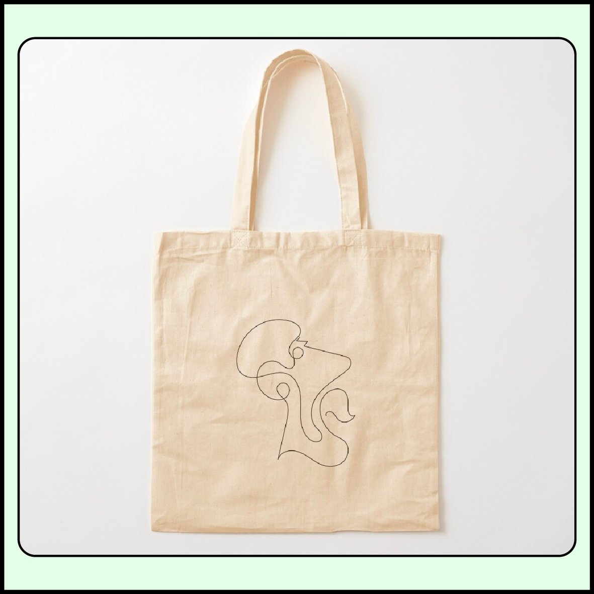 Hand-drawn continuous line portrait illustration by ArabicVectors displayed on a tote bag mockup