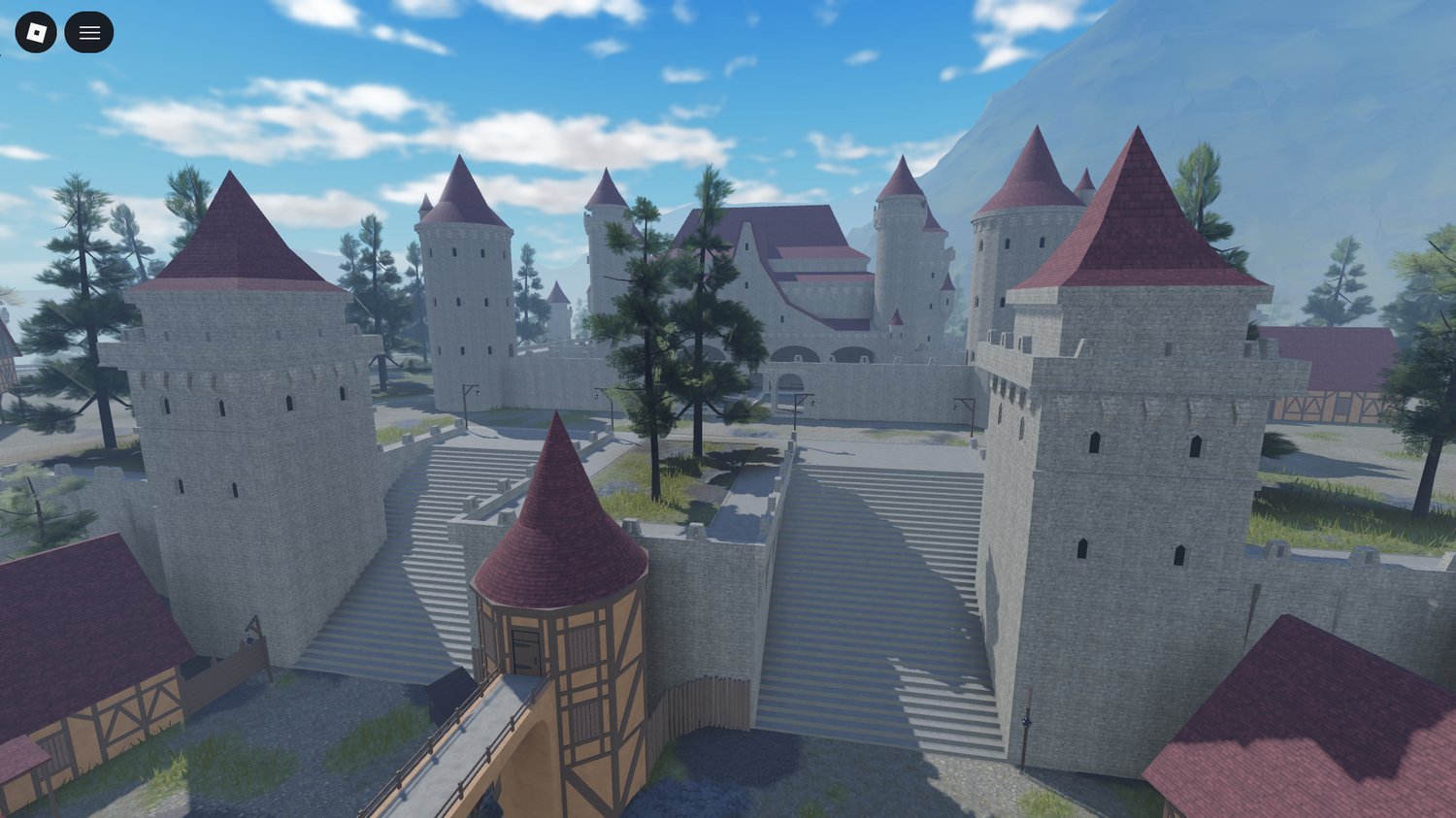 Stone castle towering above village in Roblox fantasy map