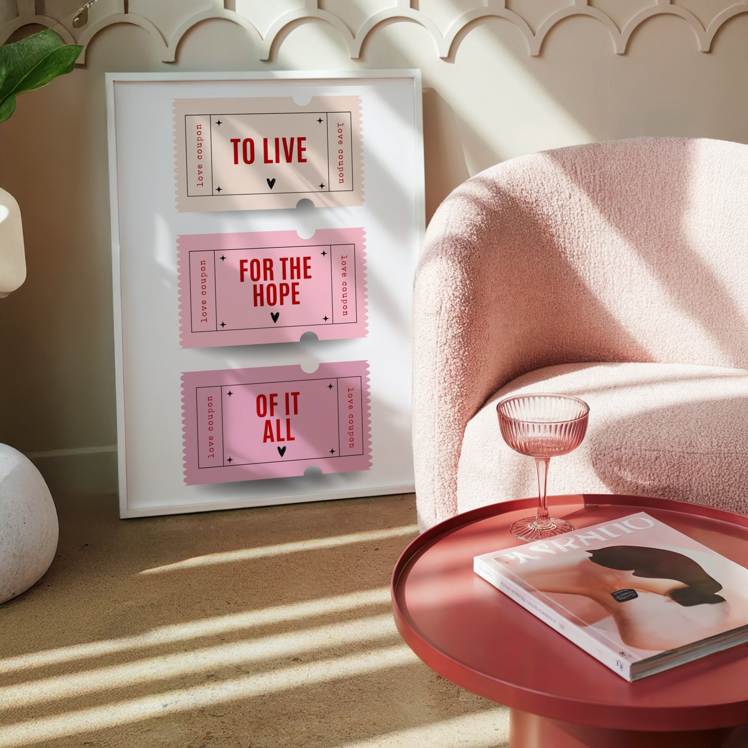 Framed quote wall art poster with stacked typography text displayed in a modern pink-toned interior.
