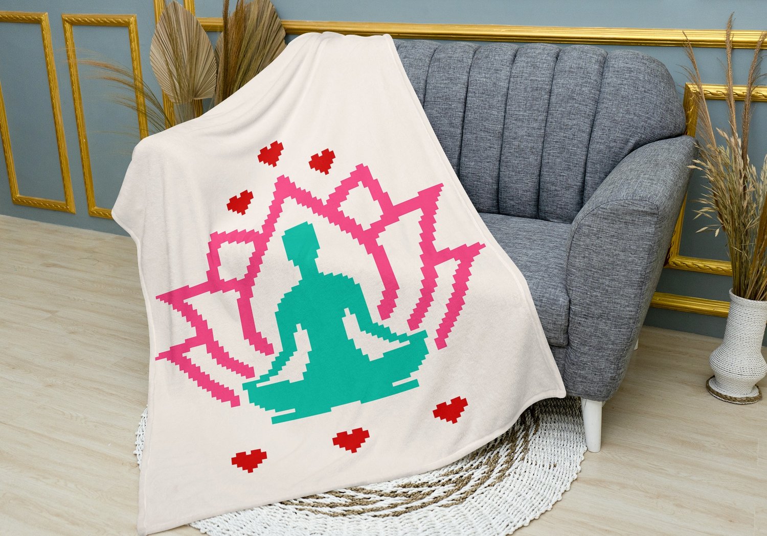Finished Om lotus C2C crochet blanket draped over chair