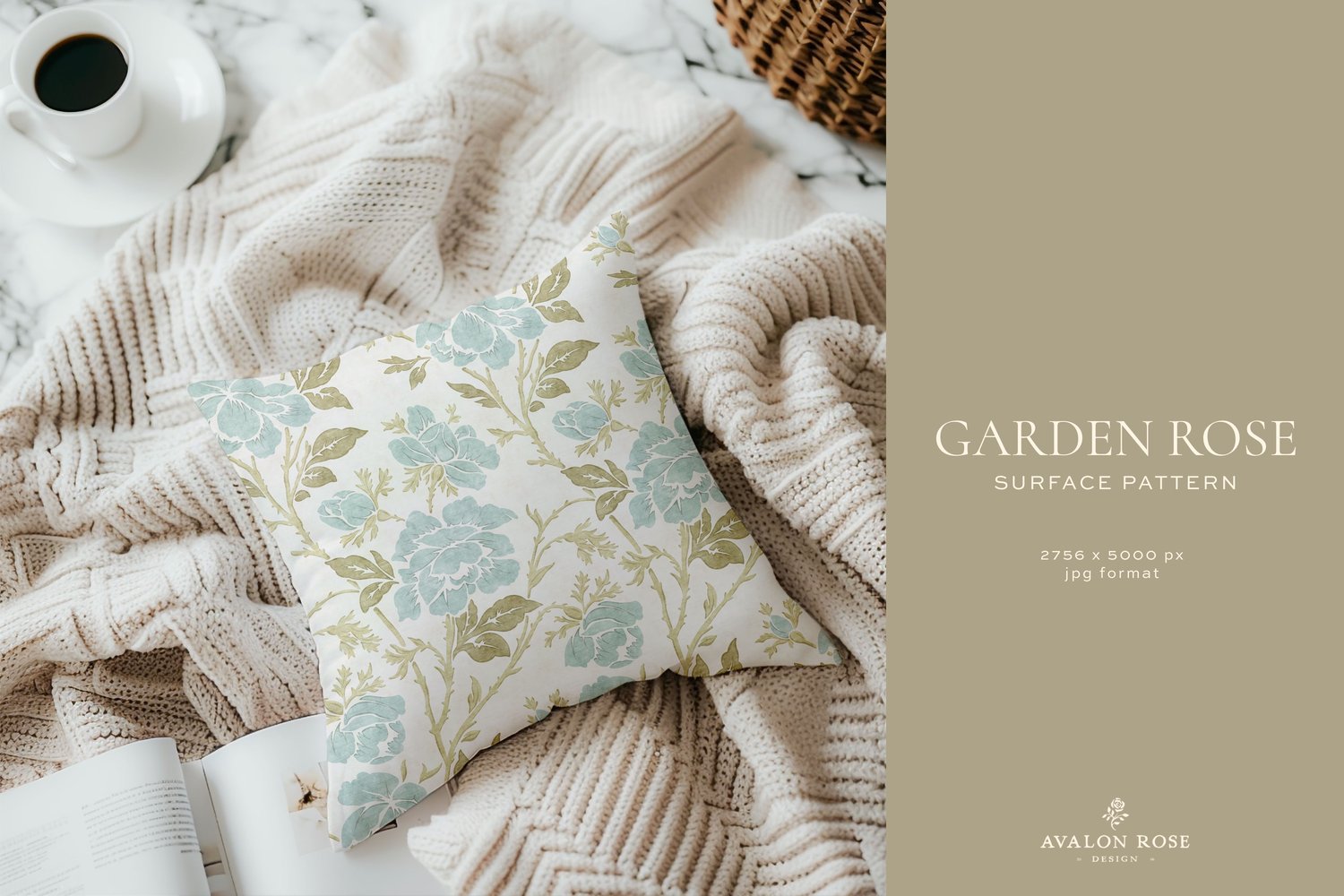 throw pillow with a vintage rose illustration surface pattern in pale blue, sage green, and white