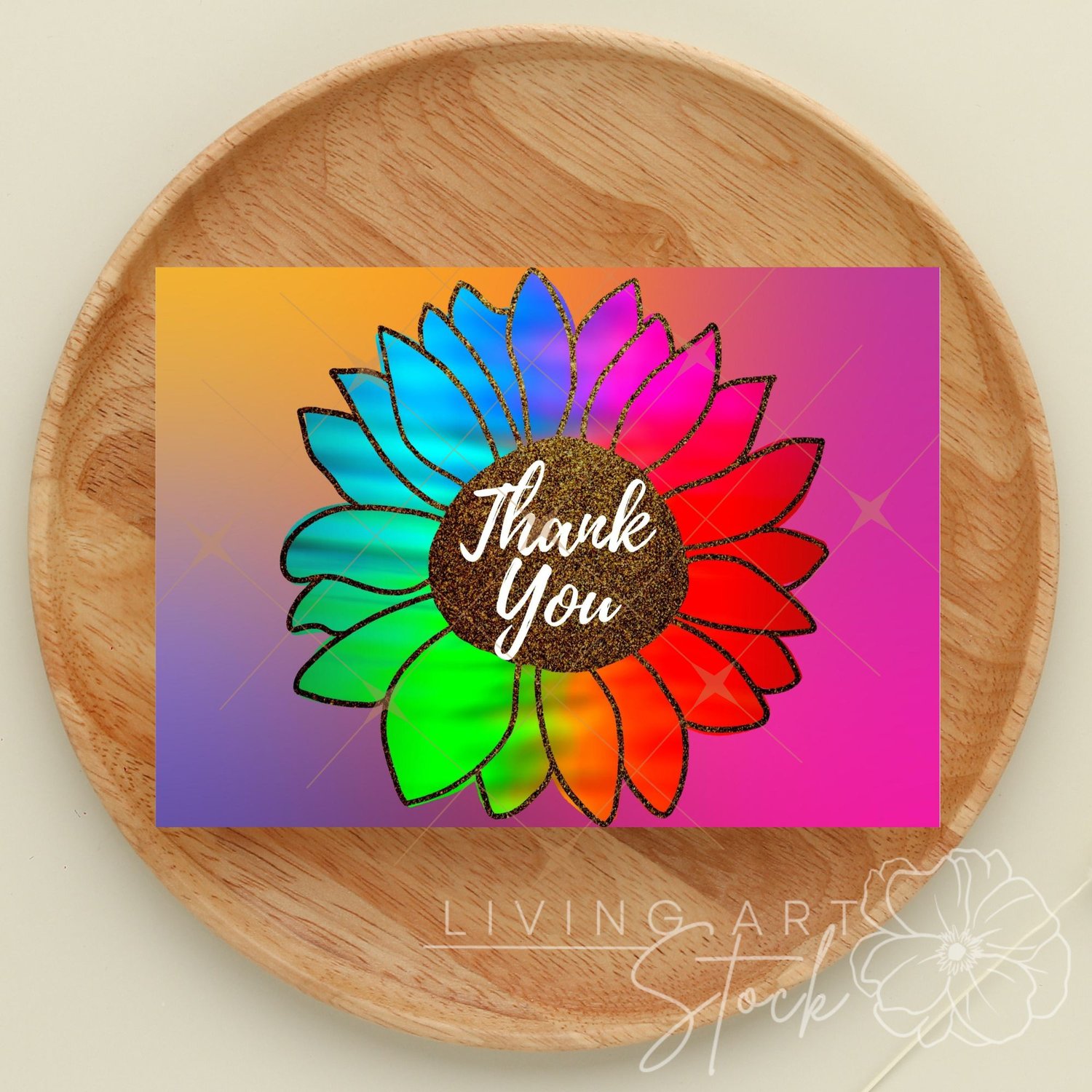 This eye-catching digital illustration features a large, stylized sunflower with petals rendered in a vivid rainbow ombre gradient spanning blue, purple, pink, orange, and green. The center of the flower is textured with a realistic brown glitter effect, 