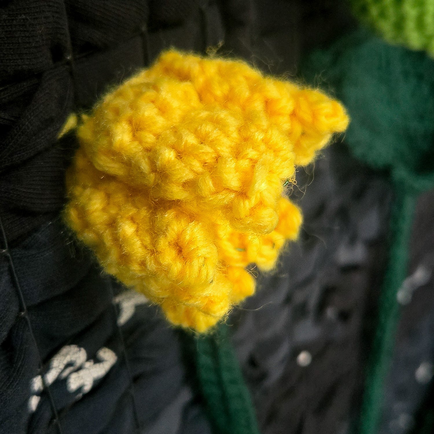 Crochet cucumber flower made from yarn, sculpted botanical flower created using a crochet pattern PDF.