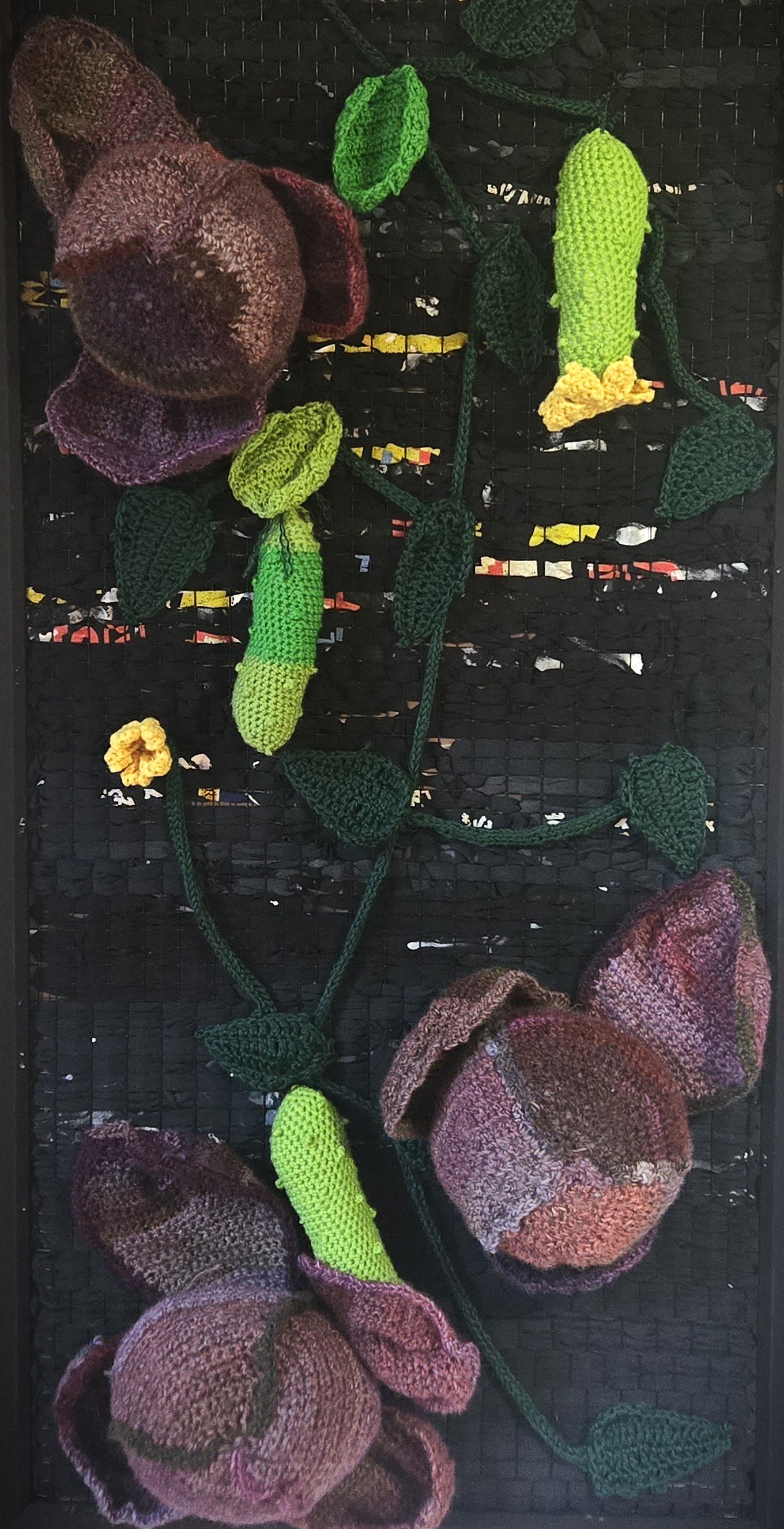 a crochet vegetable garden on a fabric garden bed