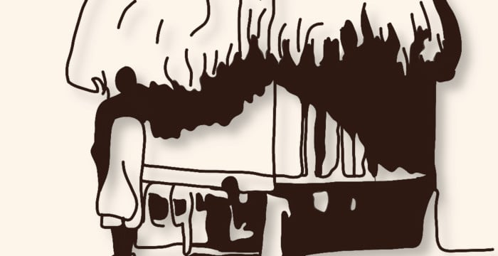 closeup of figure and hut