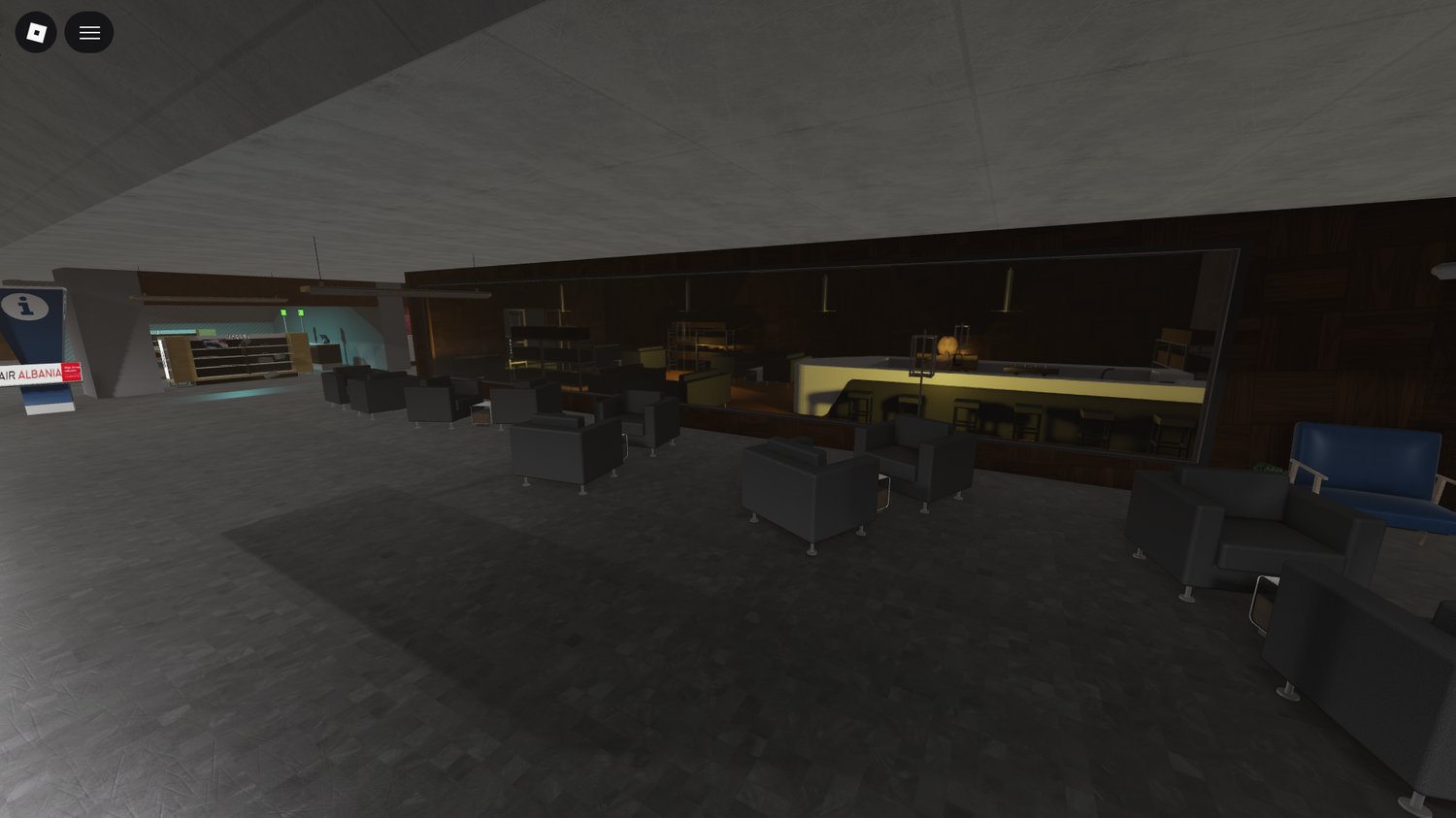 Check-in area with multiple booths and baggage truck