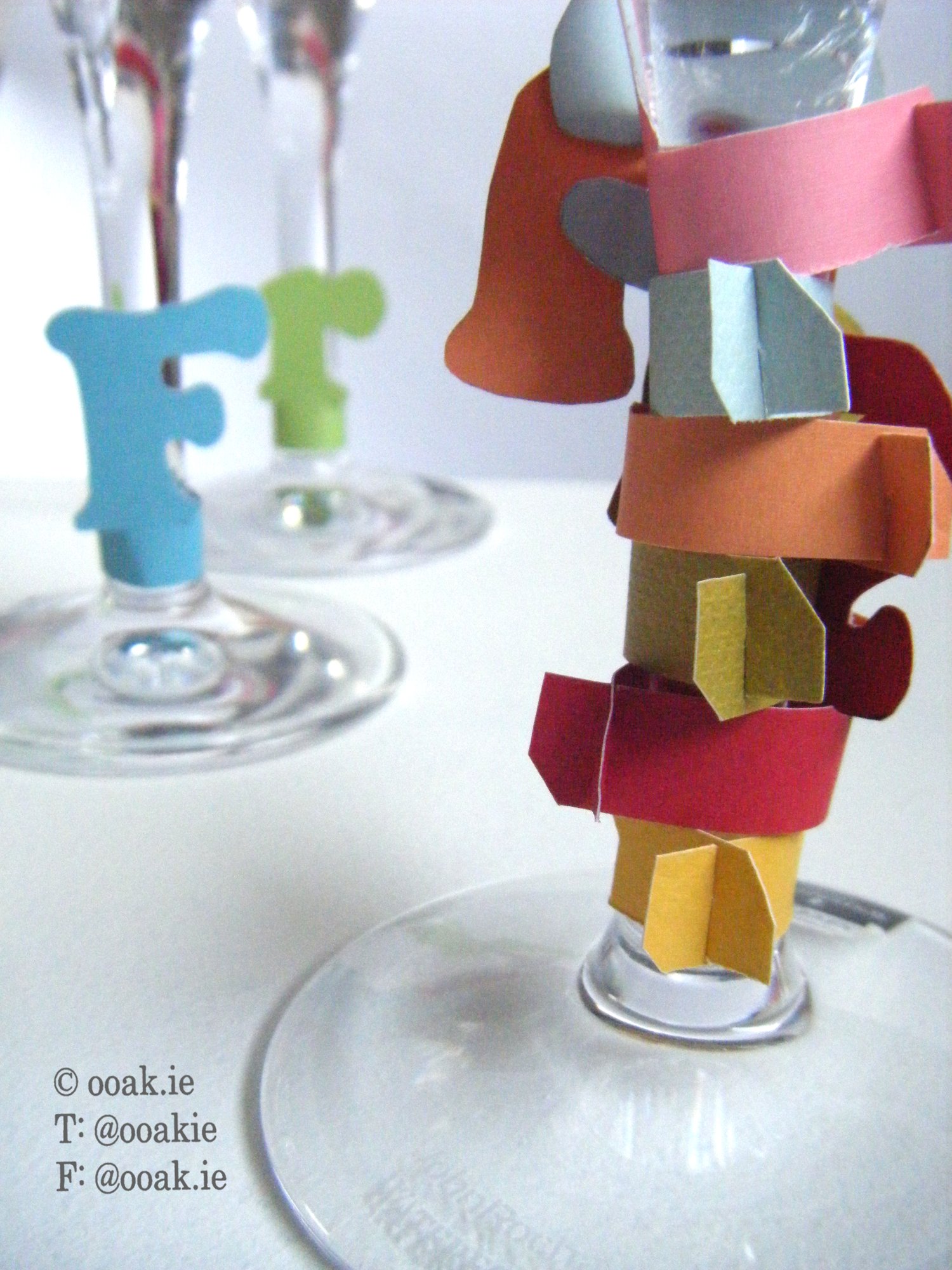8 printable star-themed wine glass tags spelling FRIENDS, displayed as DIY drink markers on wine glass stems.