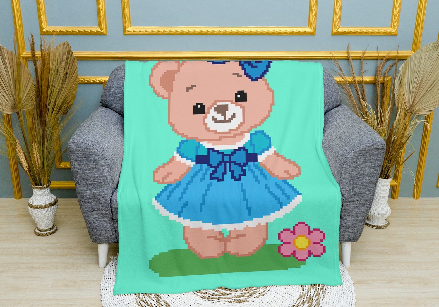 Corner to Corner teddy bear girl crochet blanket shown as finished baby blanket.