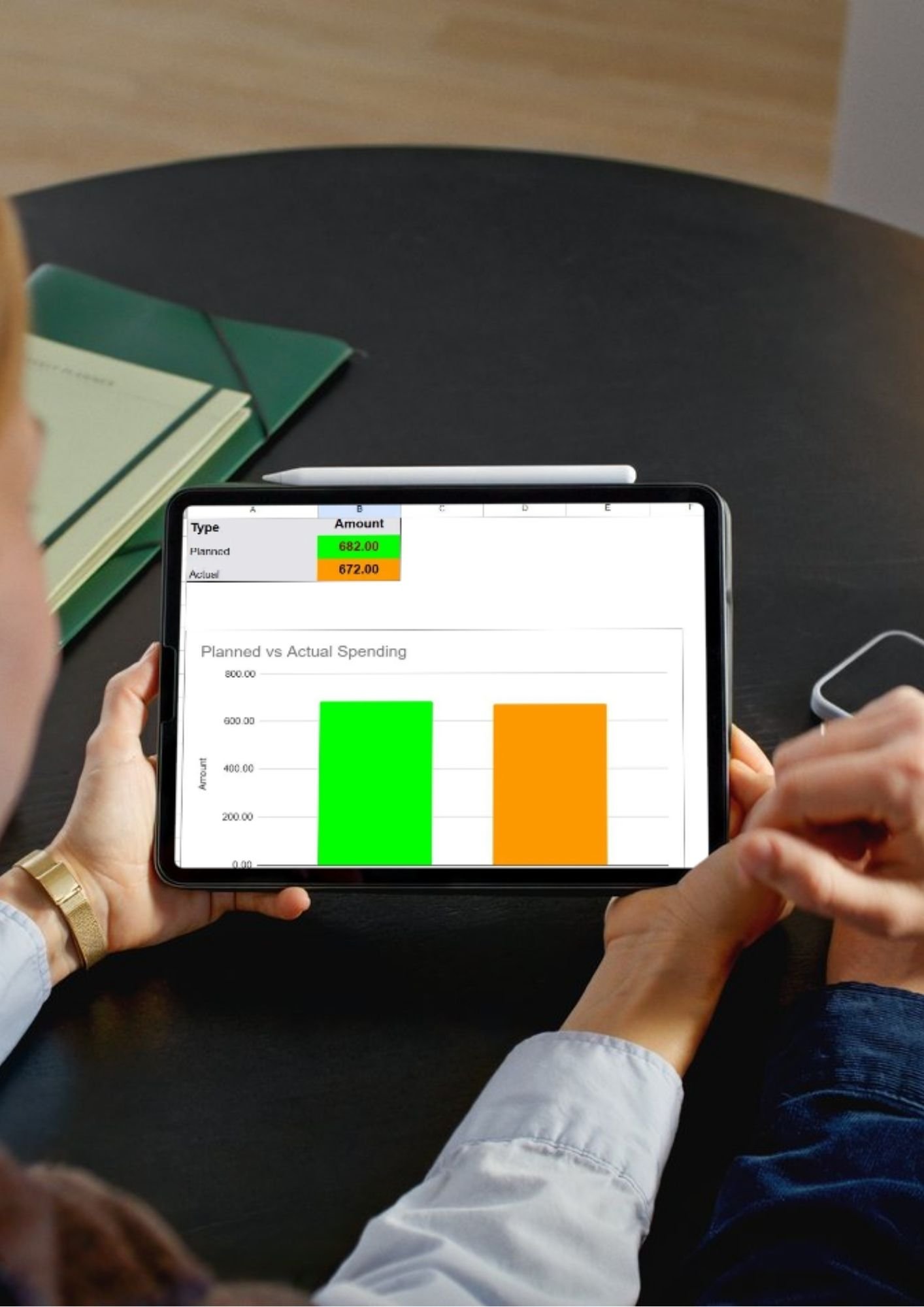"Travel budget visualizer on a tablet showing a side-by-side bar chart of planned versus actual spending for easy trip expense tracking
