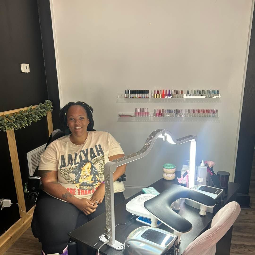 Nail technician creating seasonal nail promotions to attract clients and grow the business.