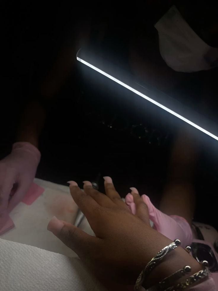 Nail technician maintaining work-life balance to provide better services and grow the business.