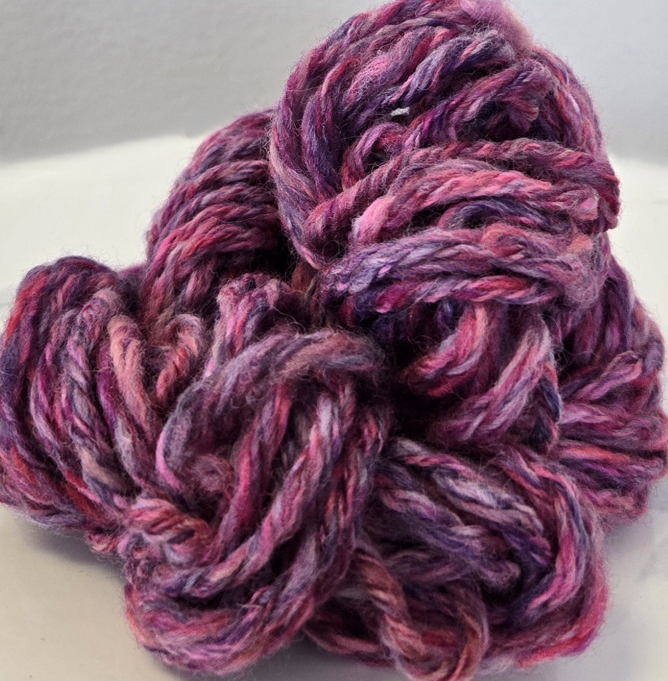 pink and purple wool yarn