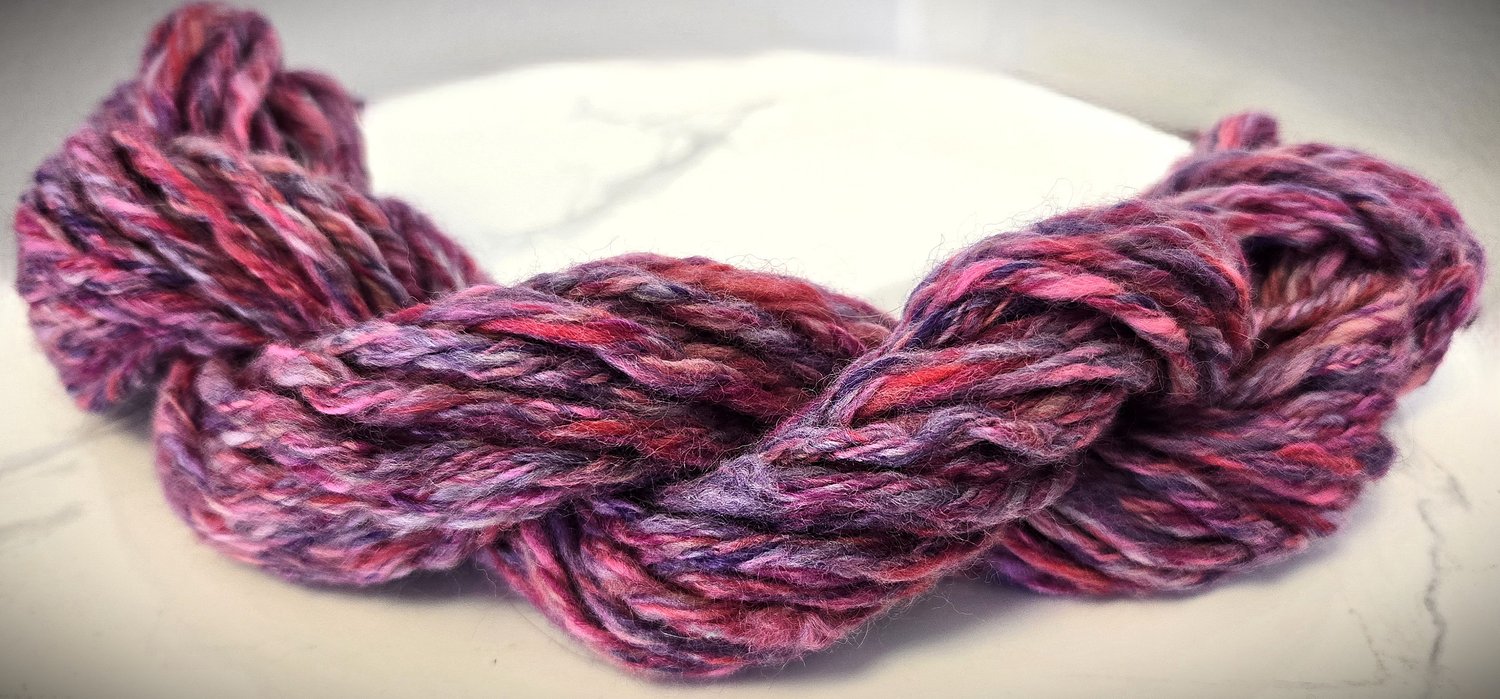 pastel pink and purple wool yarn